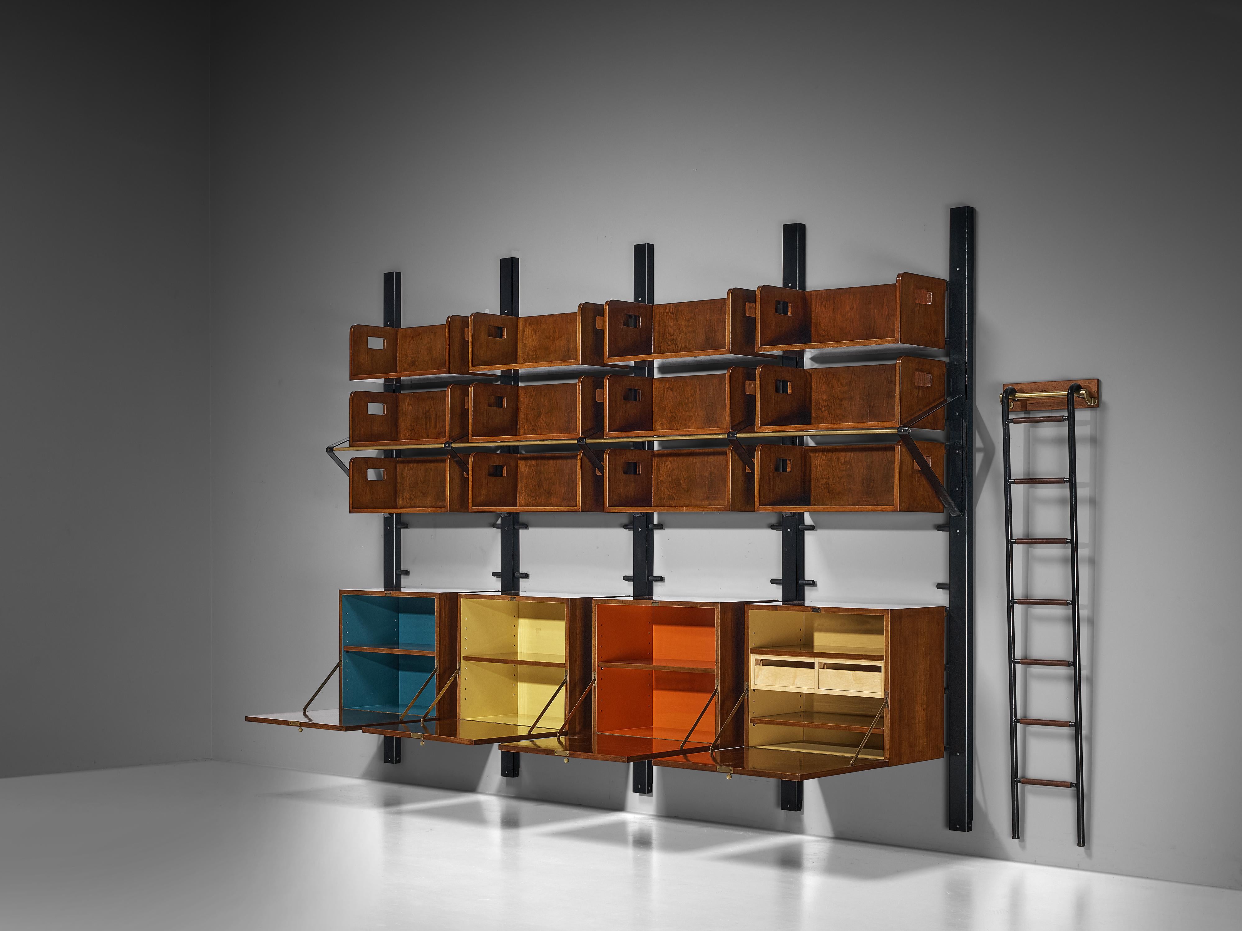 Library wall unit, walnut, lacquered iron, brass, leather, Italy, 1950s

Stunning custom made wall unit made in Italy in the 1950s. The bookcase highlights the makers architectural sensibility and refined taste for elegant proportions. The
