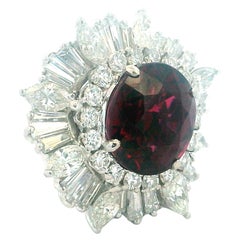 Italian Damiani Platinum Ring with 6.15 Ct Garnet and 3.25 Ct Diamonds