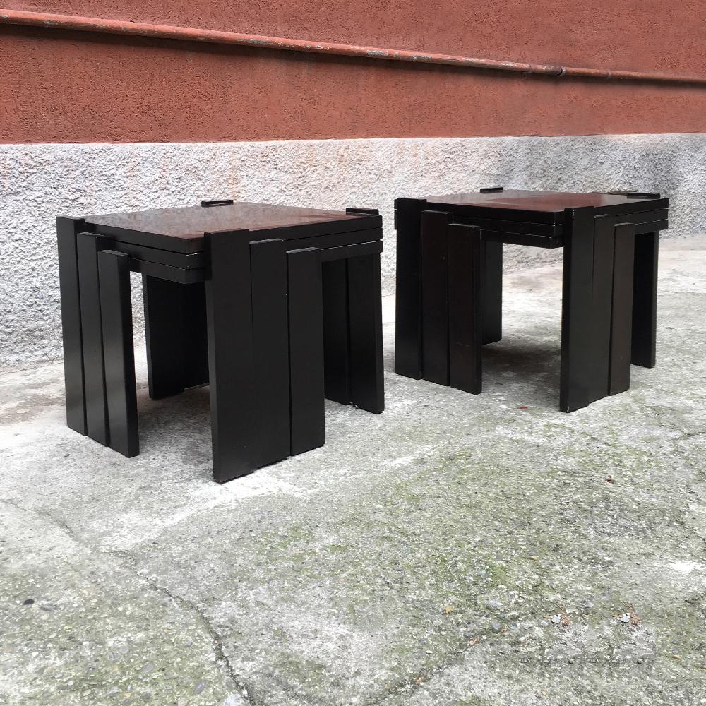 Italian dark brown color lacquered wood coffee tables, 1970s
Trio of dark brown color lacquered wood tables with interlocking overlap
Good conditions
Measures: 51 x 51 x 46 H cm.