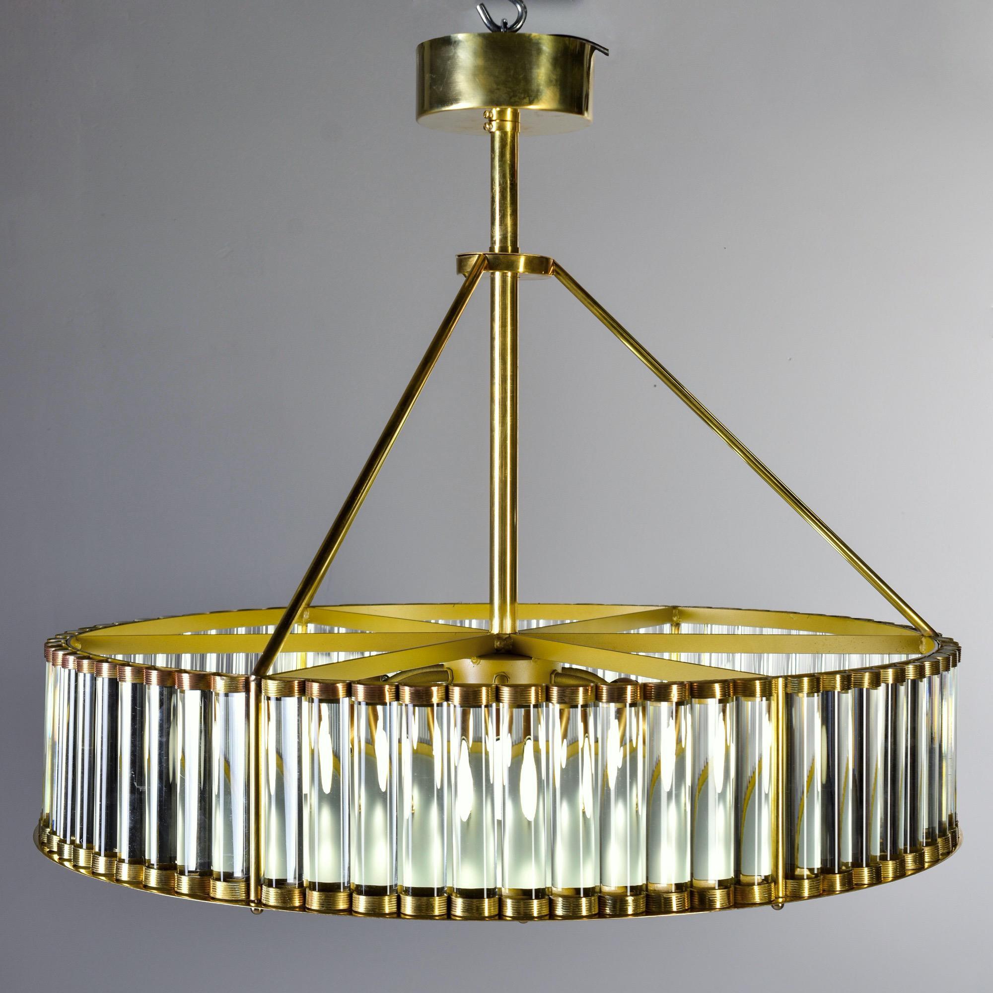 Made in Italy, this deco style hanging fixture has a shade made of thick, clear glass rods and polished brass with a satin glass cover and six standard sized sockets. New with wiring for US electrical standards.

Height shown is total from finial