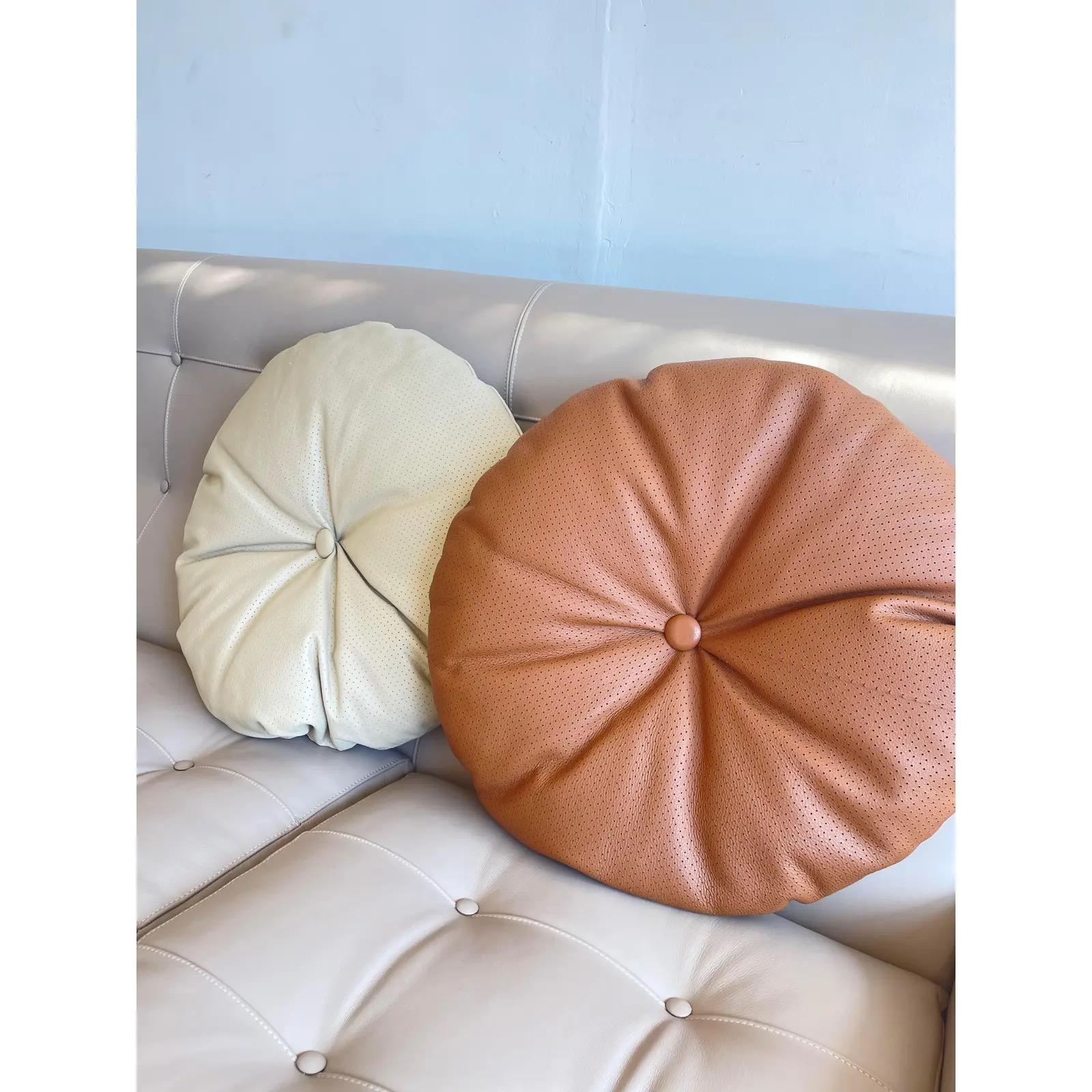 Introducing a luxurious and high-quality addition to your decor, the Arflex Extra Large Round Leather Decorative Pillow. Crafted by the esteemed Italian Furniture Brand, this exquisite pillow boasts a generous 21.65