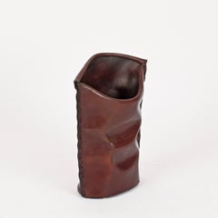 Portarotolo decorativo in pelle con motivi scultorei, prodotto da Nova Tecno, Italia, anni '70
