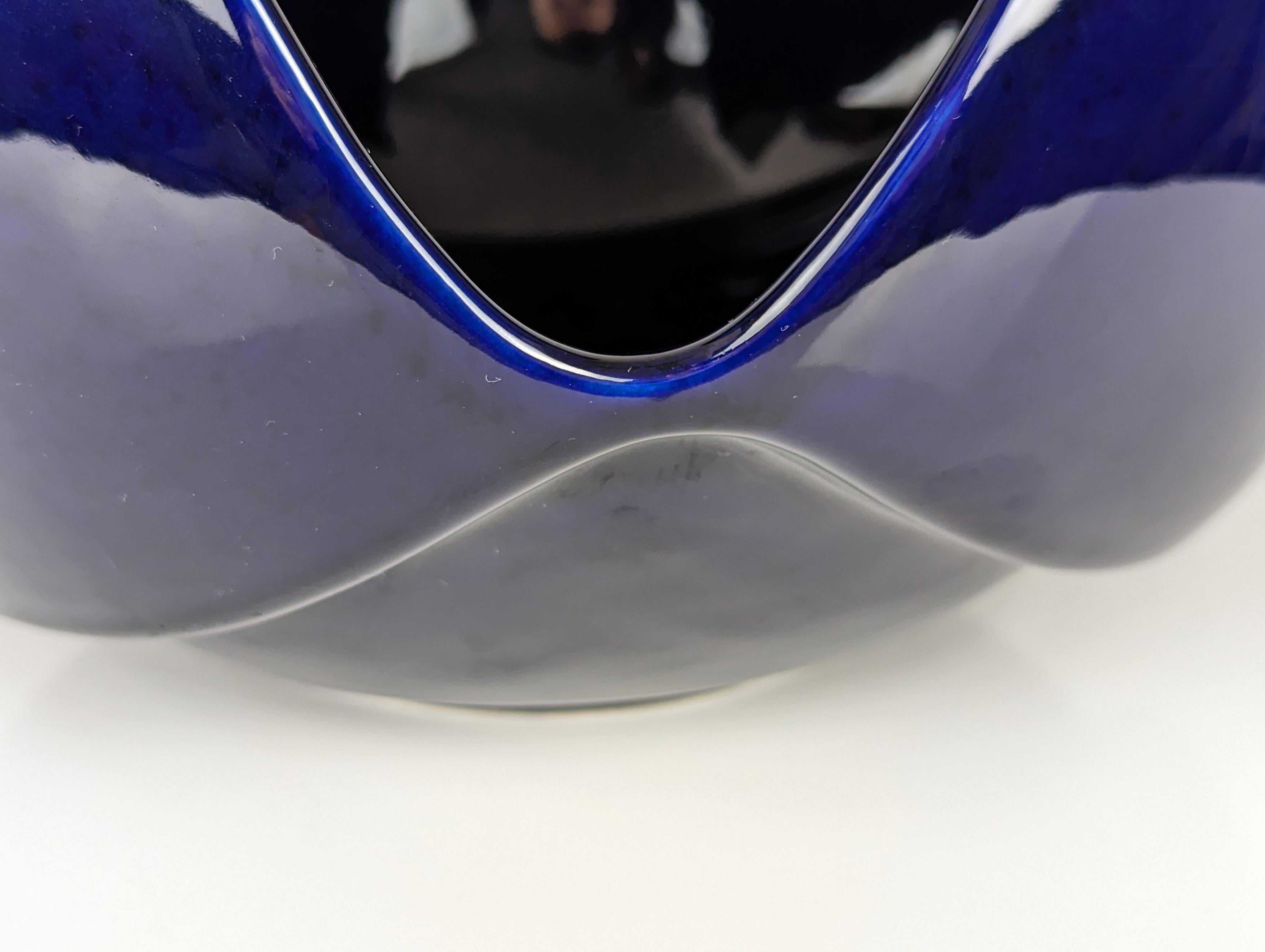 Beautiful sculptural centerpiece in blue glazed ceramic by Sele Arte, from Nove (Vicenza), Italy. Perfect vintage condition. This vase it's original and features its manufacture's label.