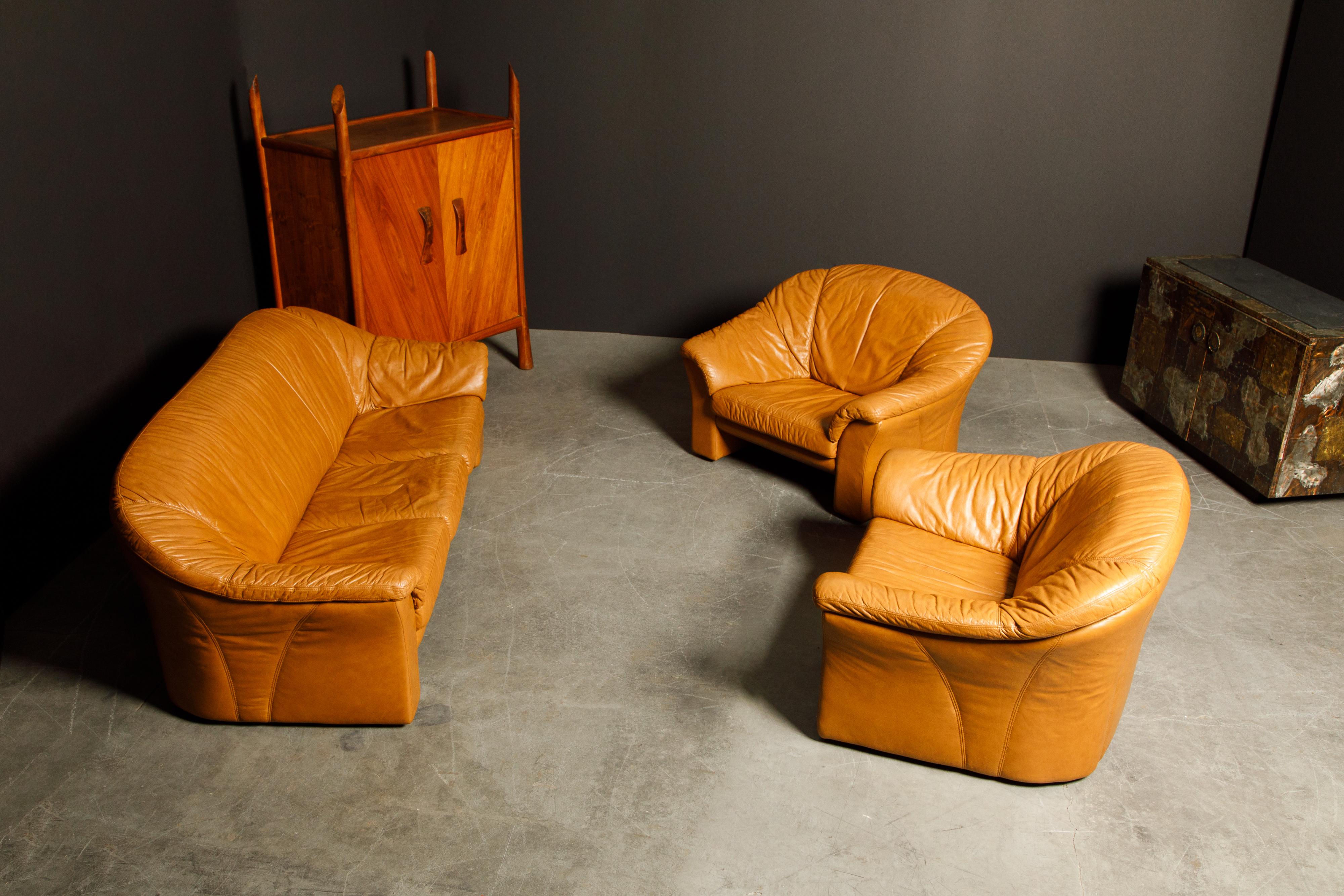 Modern Italian Deep Seated Cognac Leather Sofa and Lounge Chairs, circa 1970s