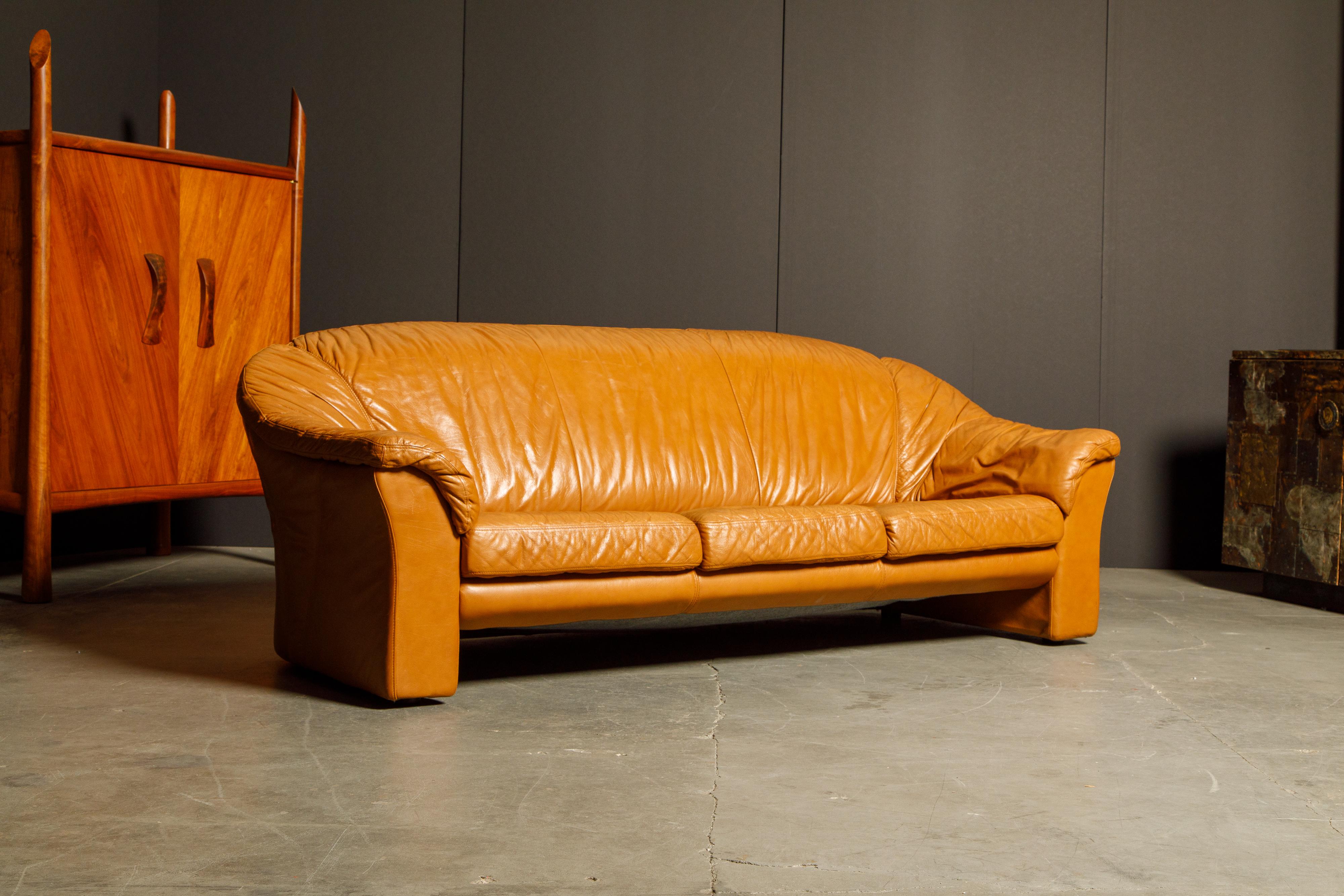 Late 20th Century Italian Deep Seated Cognac Leather Sofa and Lounge Chairs, circa 1970s