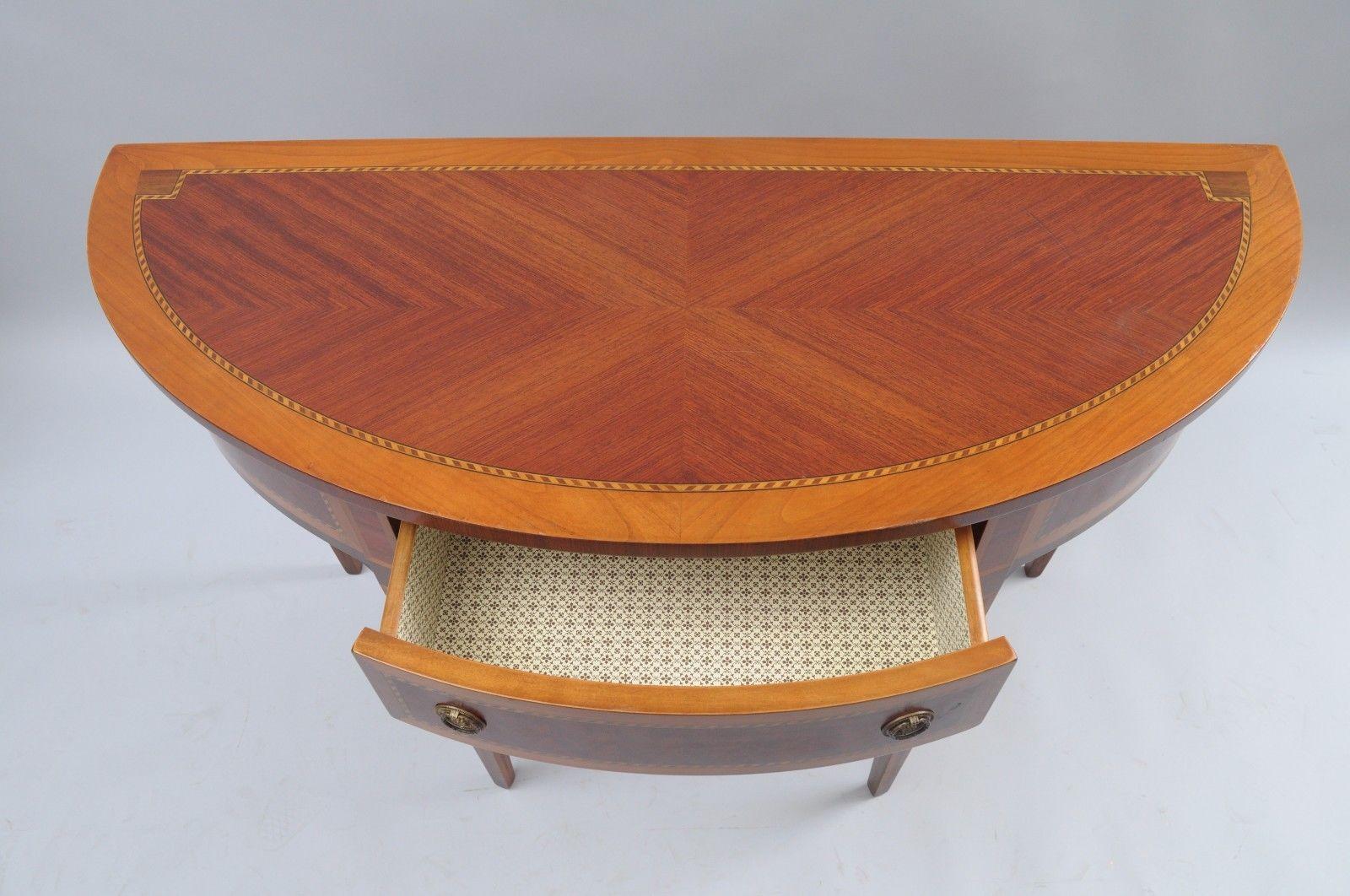 Italian demilune console hall table by Decorative Crafts Inc., Made in Italy. Item features wood construction, single drawer, banded and inlaid throughout, sunburst top, beautiful woodgrain, Hand crafted in Italy, Original labels to rear, circa 21st