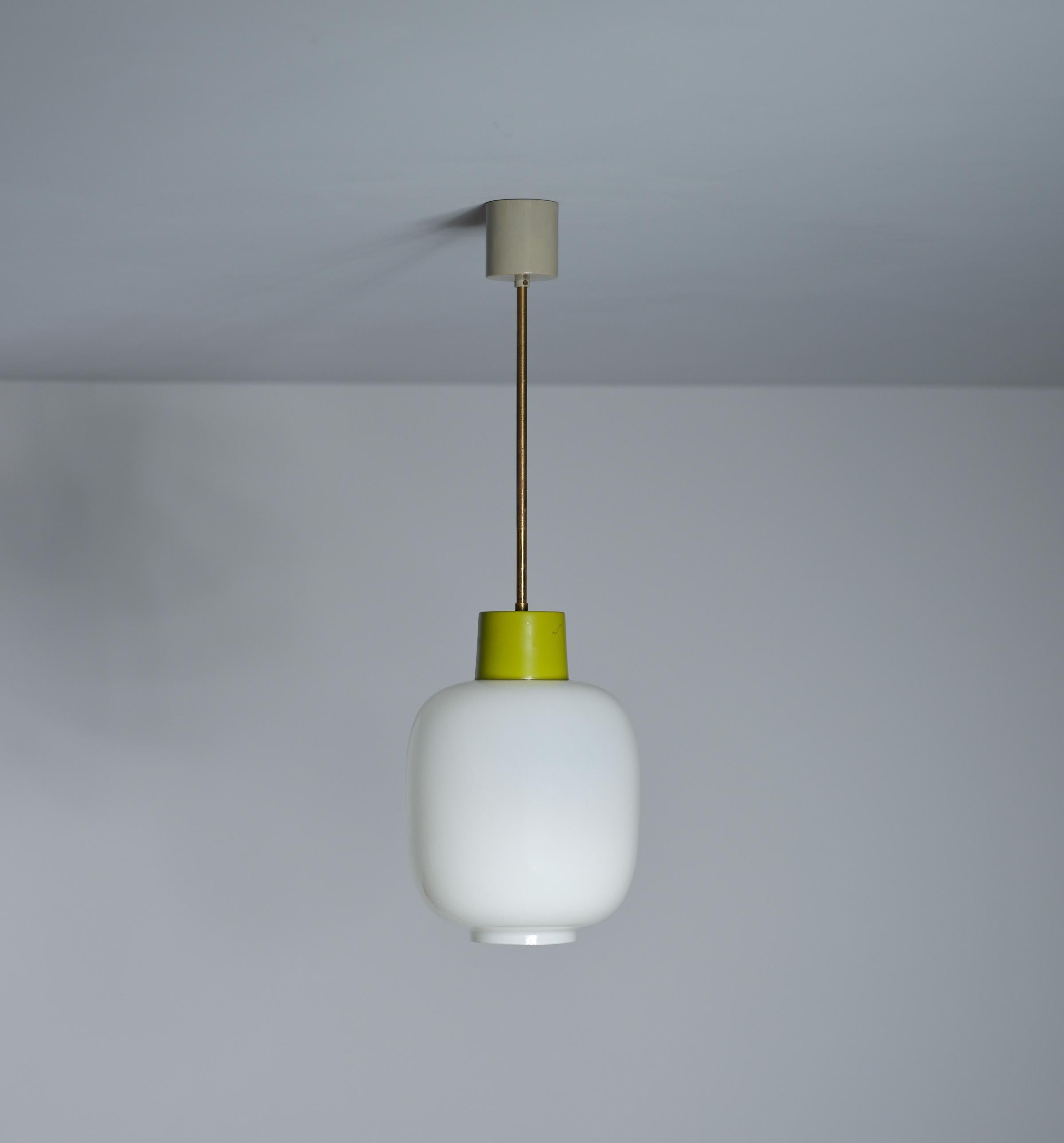 Presenting a  vibrant and playful ceiling pendant lamp that embodies the essence of Italian design from the 1960s. Crafted with a mix of frosted glass, brass with original patina , olive green lacquered metal, and grey lacquered metal, this piece