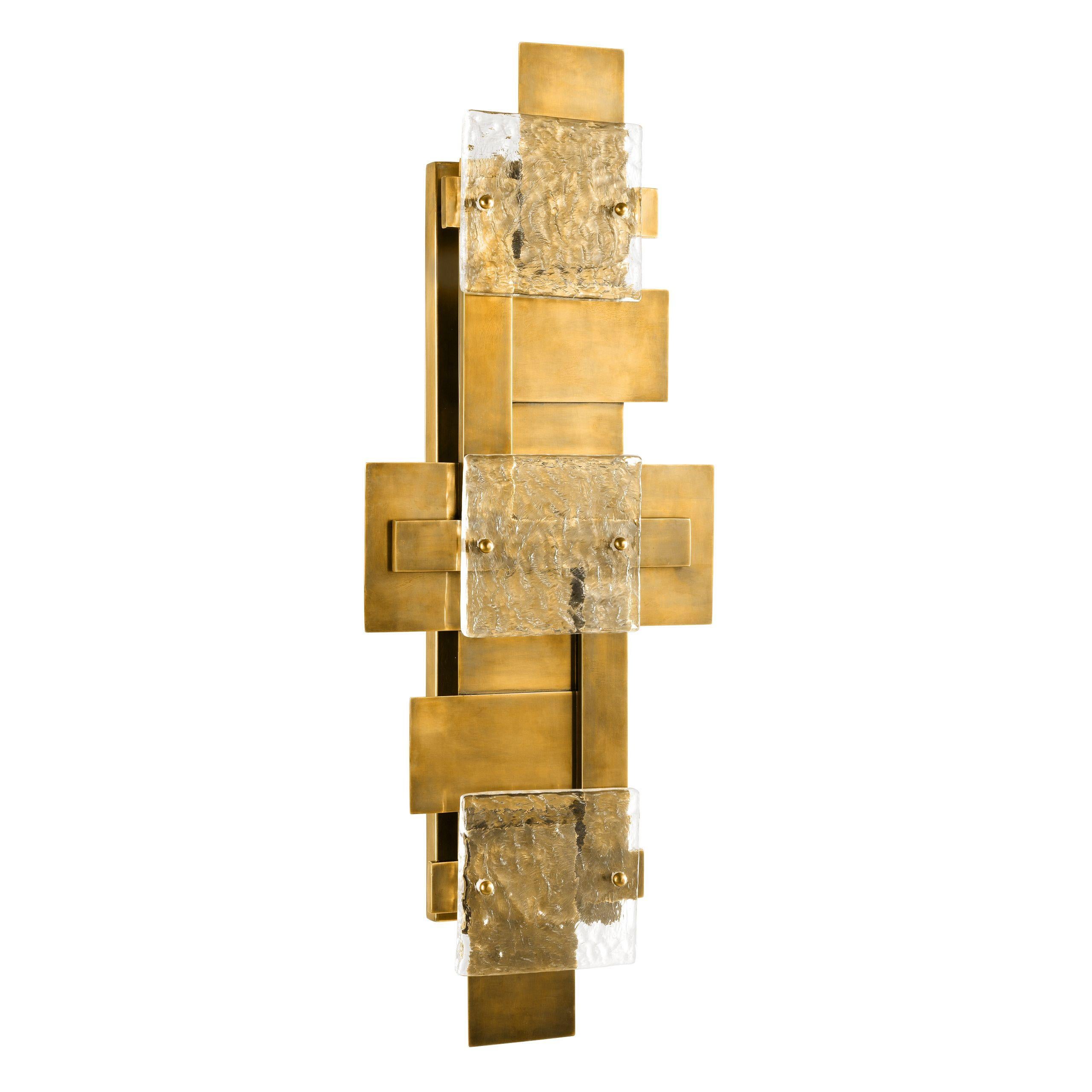 Italian design and Brutalist style large wall light composed of an aerial brass metal structure with glass finish.