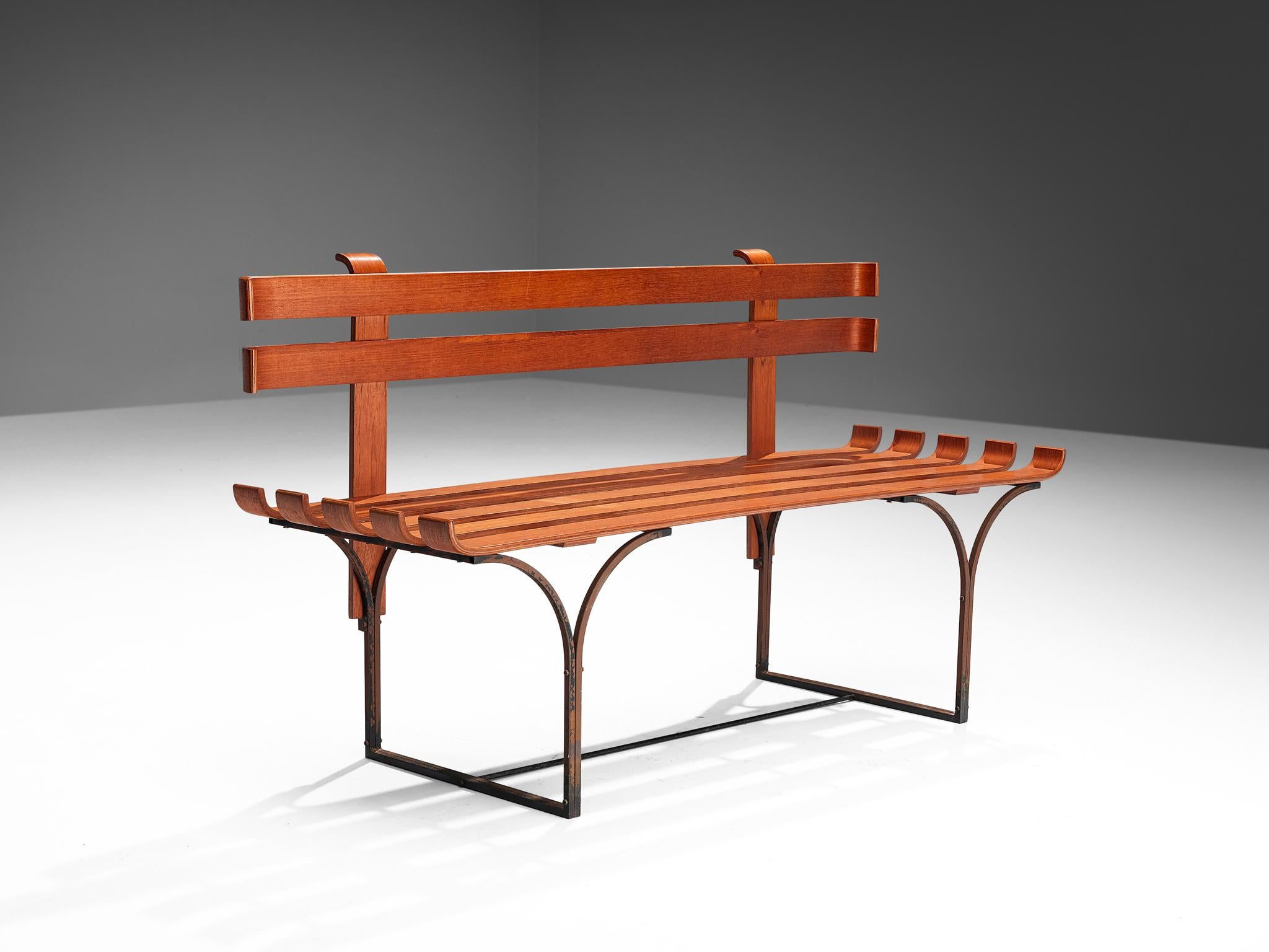 Bench, plywood, metal, Italy, 1960s

This bent plywood bench represents characteristic Italian design elements such as the playful lines of the bent frame and the typical basic design of the plywood. The overall effect of the bench is decidedly