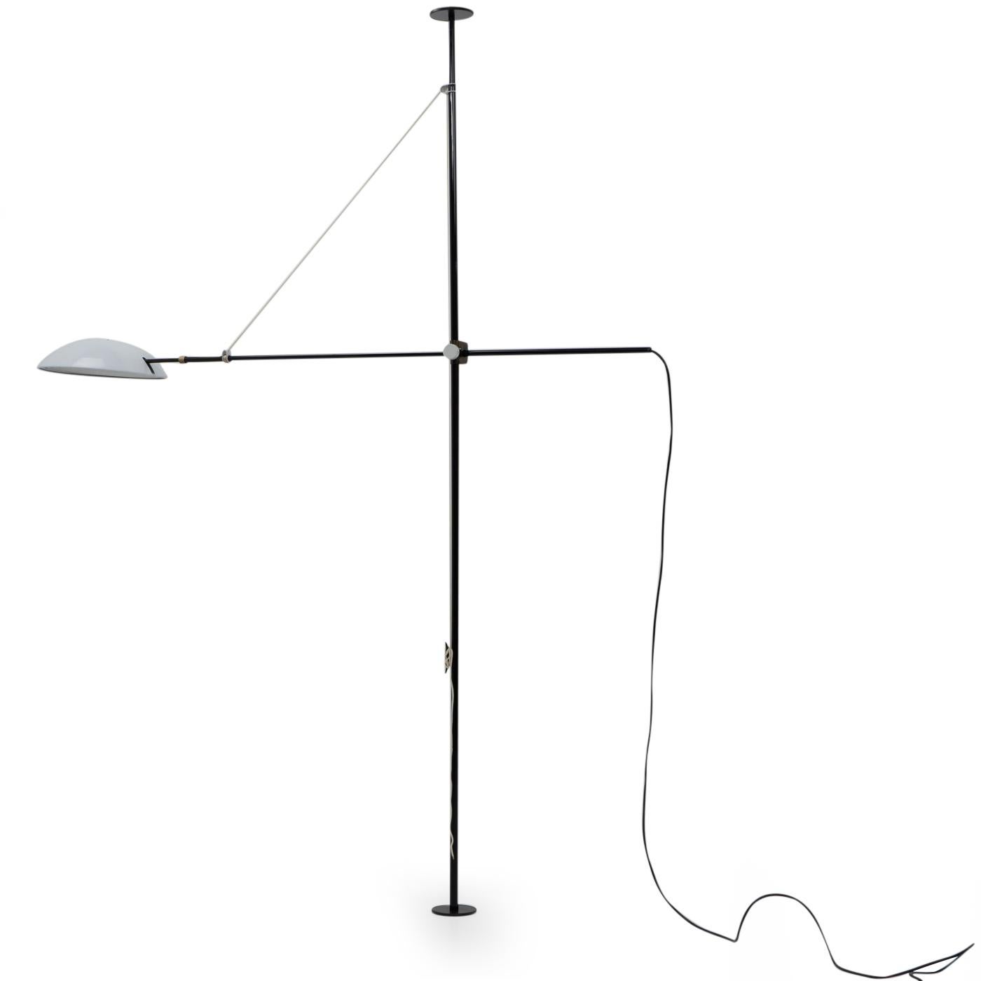 The Bigo floor-to-ceiling lamp was designed by S.T. Valenti during the 1980s in Italy.

The lamp is tensioned between ceiling and floor, using a height adjustable metal tube, and provides support for the extendable arm (up to 255 cm). The arm is