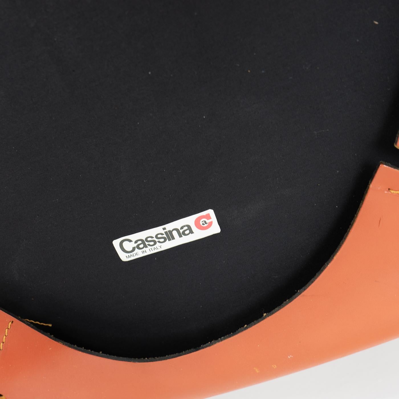 Set of eight cab 412 side chairs in red / orange3 leather by Mario Bellini for Cassina.

The cab chair is built up as a tubular frame over which thick saddle leather is fitted; the leather skin is kept in place with zippers on the inside