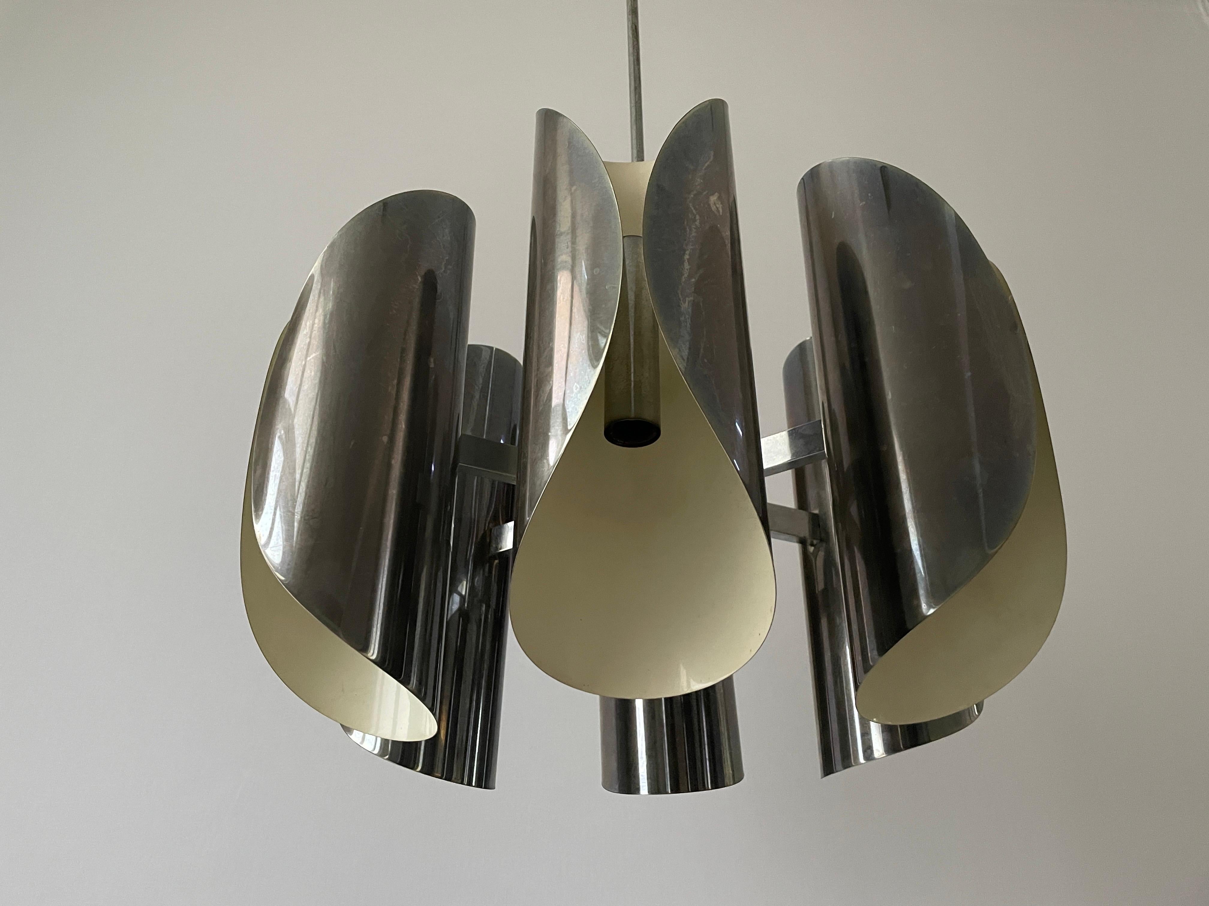 Italian Design Chrome 6-head Ceiling Lamp by Reggiani, 1960s, Italy

Lampshade is in very good vintage condition.

This lamp works with 12x E14 light bulbs. 
Wired and suitable to use with 220V and 110V for all countries.

Measurements: 
Height:
