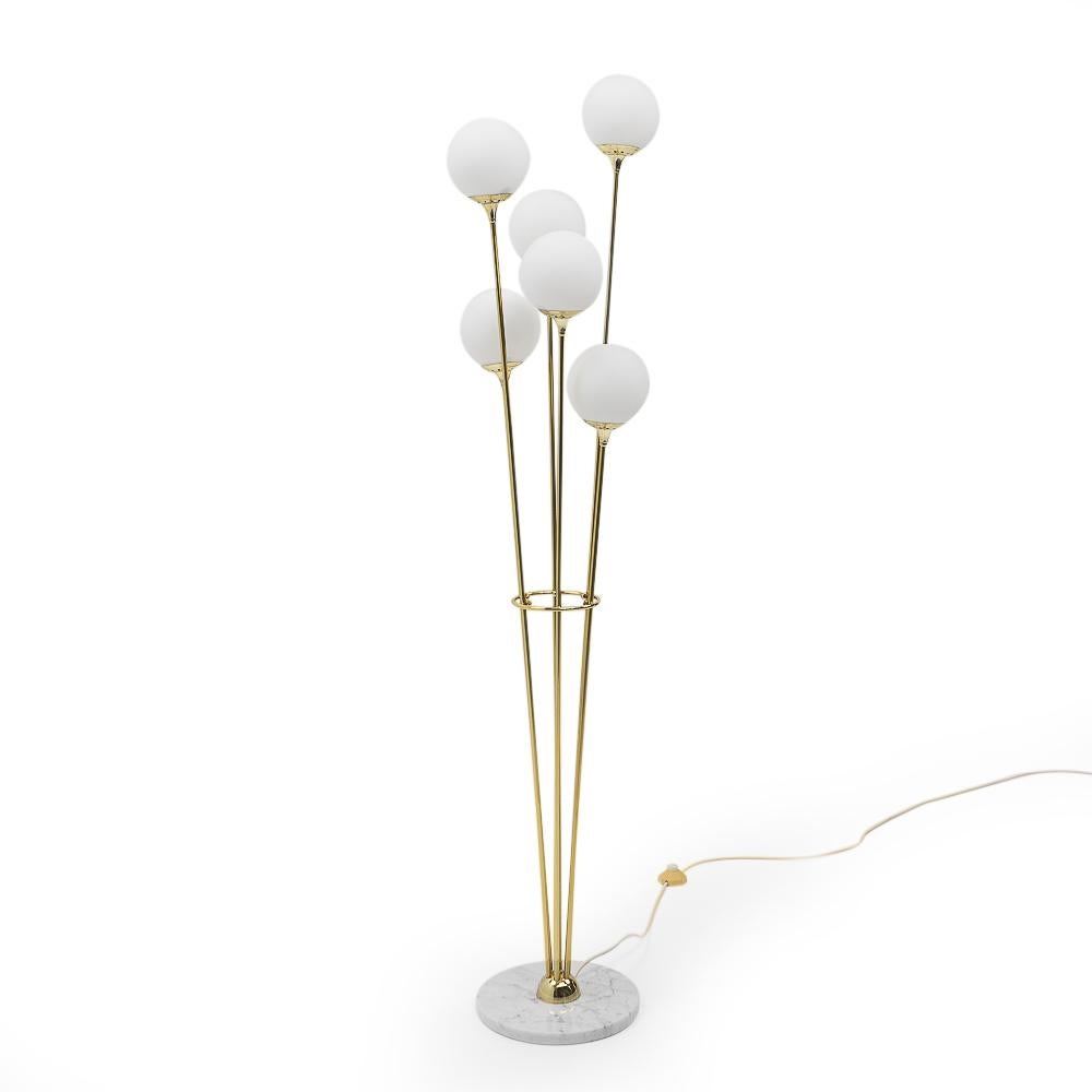 Italian vintage “Alberello” floor lamp, most likely a Stilnovo production from the 1970s.

This highly decorative floor lamp stands on a marble base, and consists of six stems in gilded brass, it is beautiful in appearance and due to its smaller