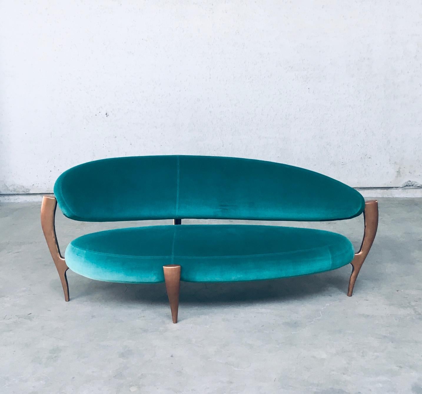 Rare Postmodern modern Italian design floating free form curved 3 seat Sofa with Sculptural base. Made in Italy 1990's. Made with the Highest quality materials. Velvet turquoise sea green fabric on handmade solid copper metal feet base. Beautiful