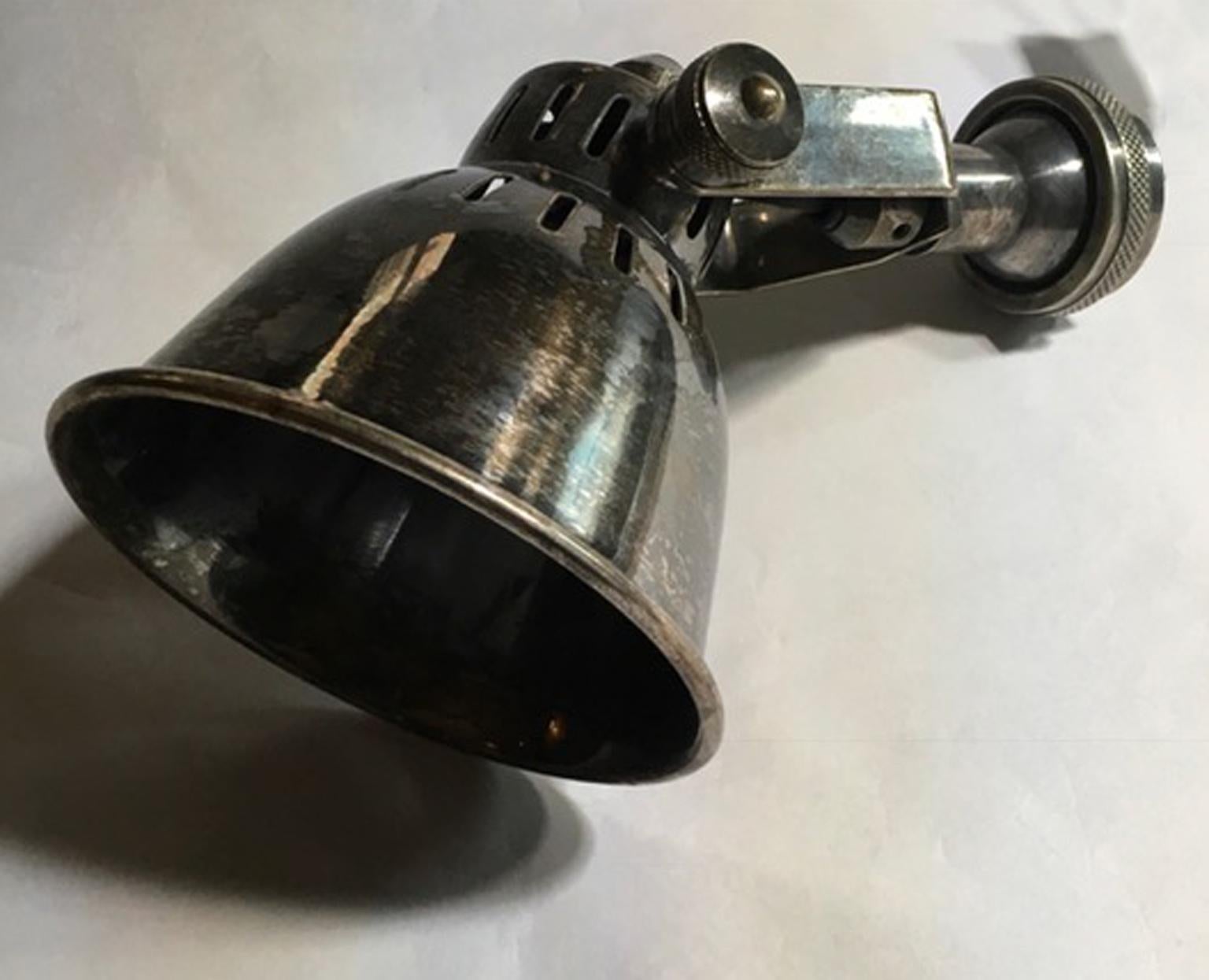 Italian design iron wall sconce in industrial style contemporary production in ralph Lauren style.

The sconce is in the finish like a 