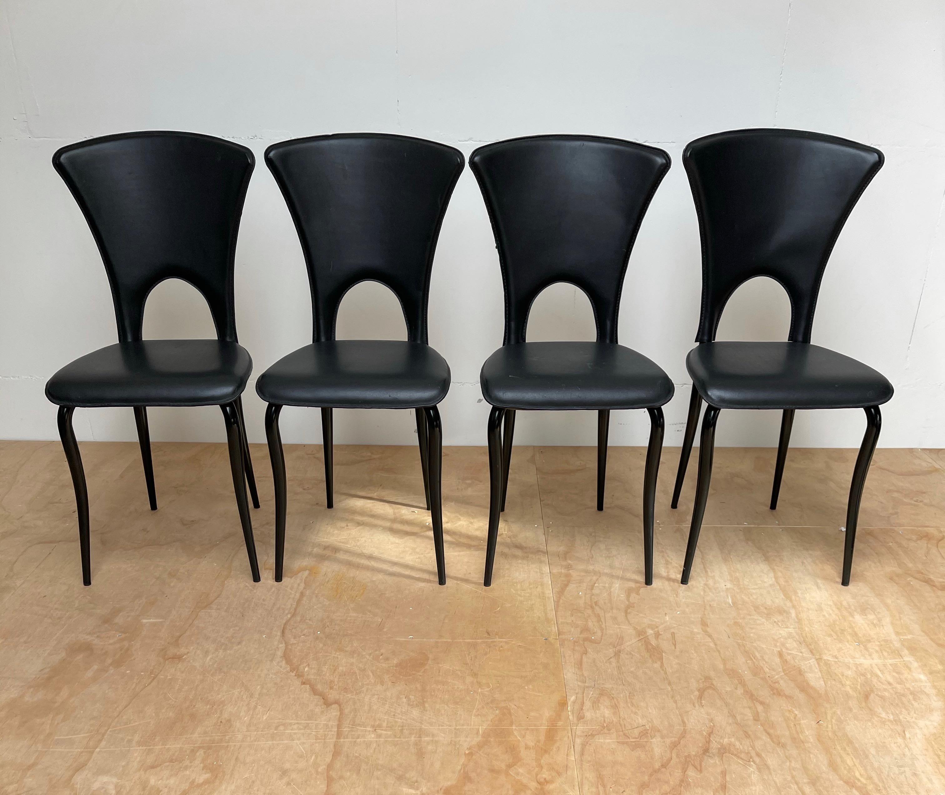 Rare and completely original set of four stylish dining chairs.

This beautiful set of very stylish chairs is another one of our recent great finds. The flowing lines in the design combined with the materials make this sleek set of dining chairs