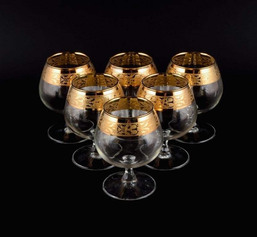 Italian design, six Brandy glasses in clear art glass with gold rim.
Approx. 1960s/70s.
In perfect condition.
Marked.
Dimensions: H 12.0 x D 8.0 cm.
