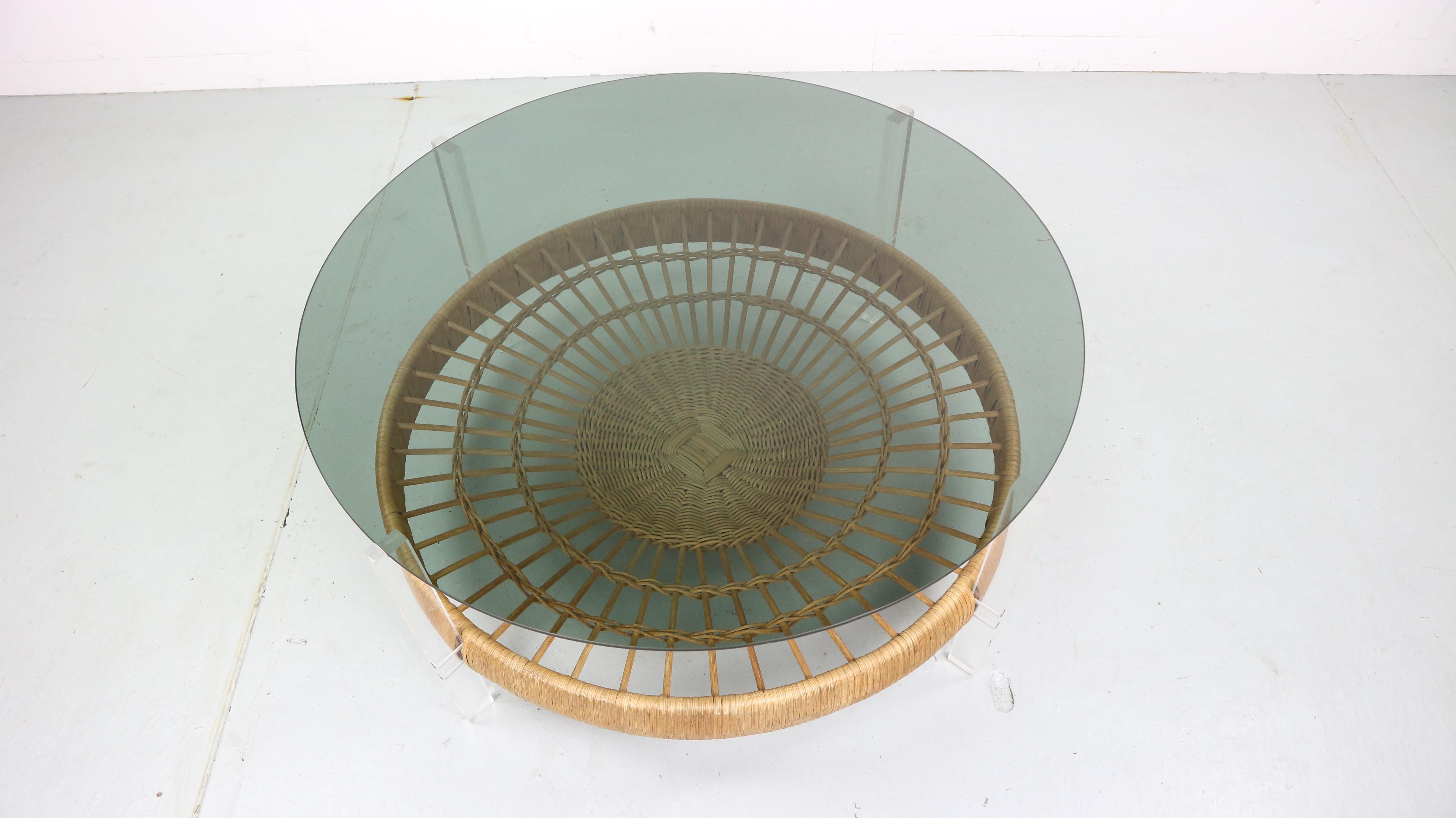 Italian Design Smoked Glass Coffee Table and Rattan Magazine Rack, 1970s In Good Condition In The Hague, NL