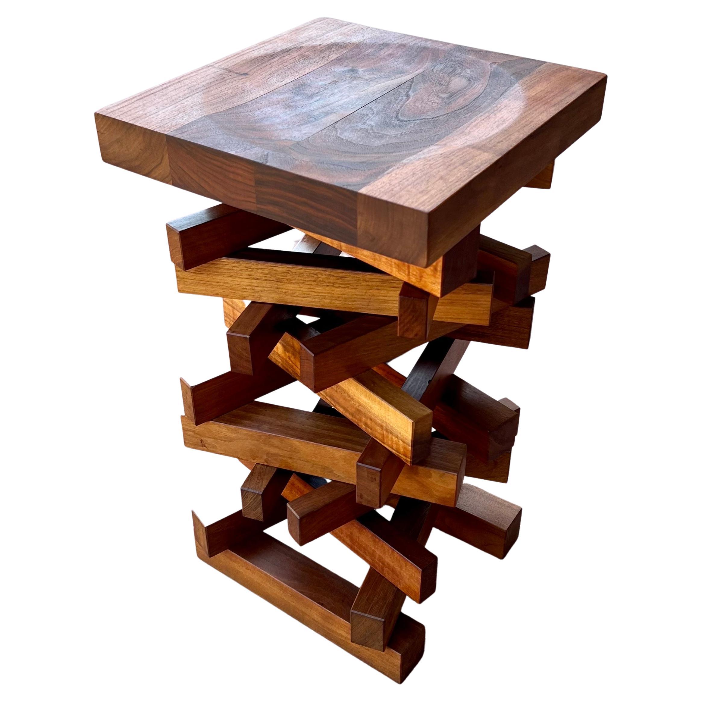 The beautiful art piece can be used as a pedestal, cocktail table, or stool made in solid walnut and handcrafted in Italy circa 2006, we have refinished and oiled the piece looks amazing beautiful patina designed by Terry Dwan California artist,