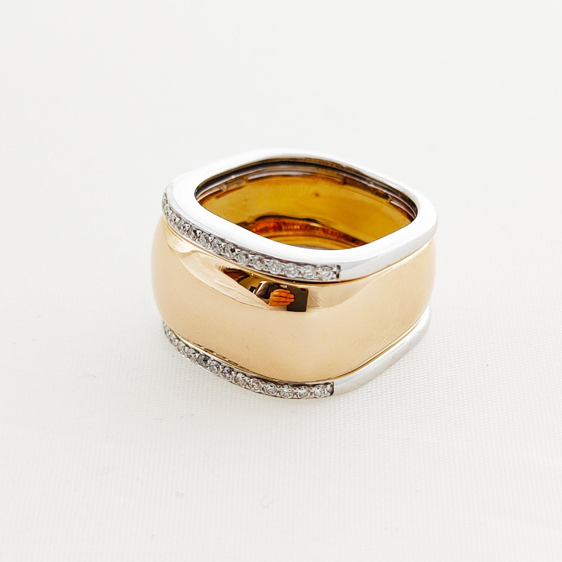 This comfortable ring has a square profile which makes this ring by Italian designer Centoventuno a modern elegant statement with a flair of masculinity for a modern, androgynous aesthetic. 

The ring is made in 18 karat rose gold. This 14mm wide