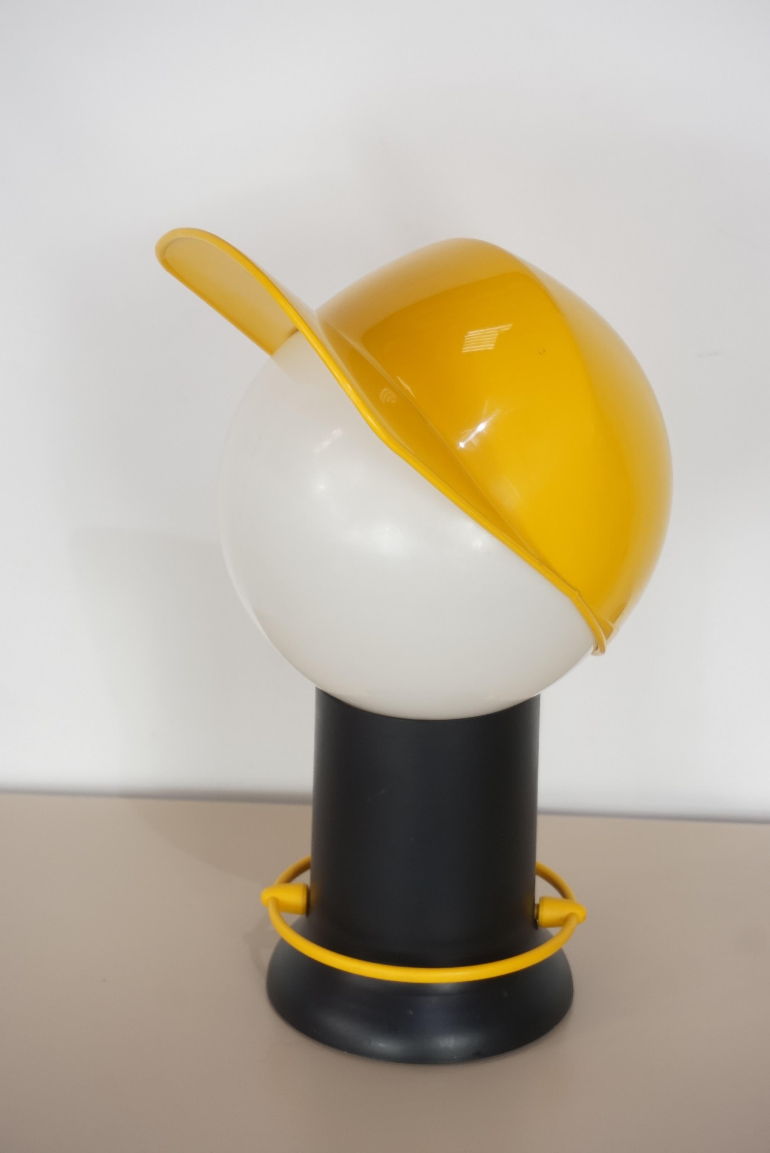 Vintage Italian design desk lamp with pretty removable yellow CAP, as named: CAP Model design by Giorgetto Giugiaro for Bilumen.