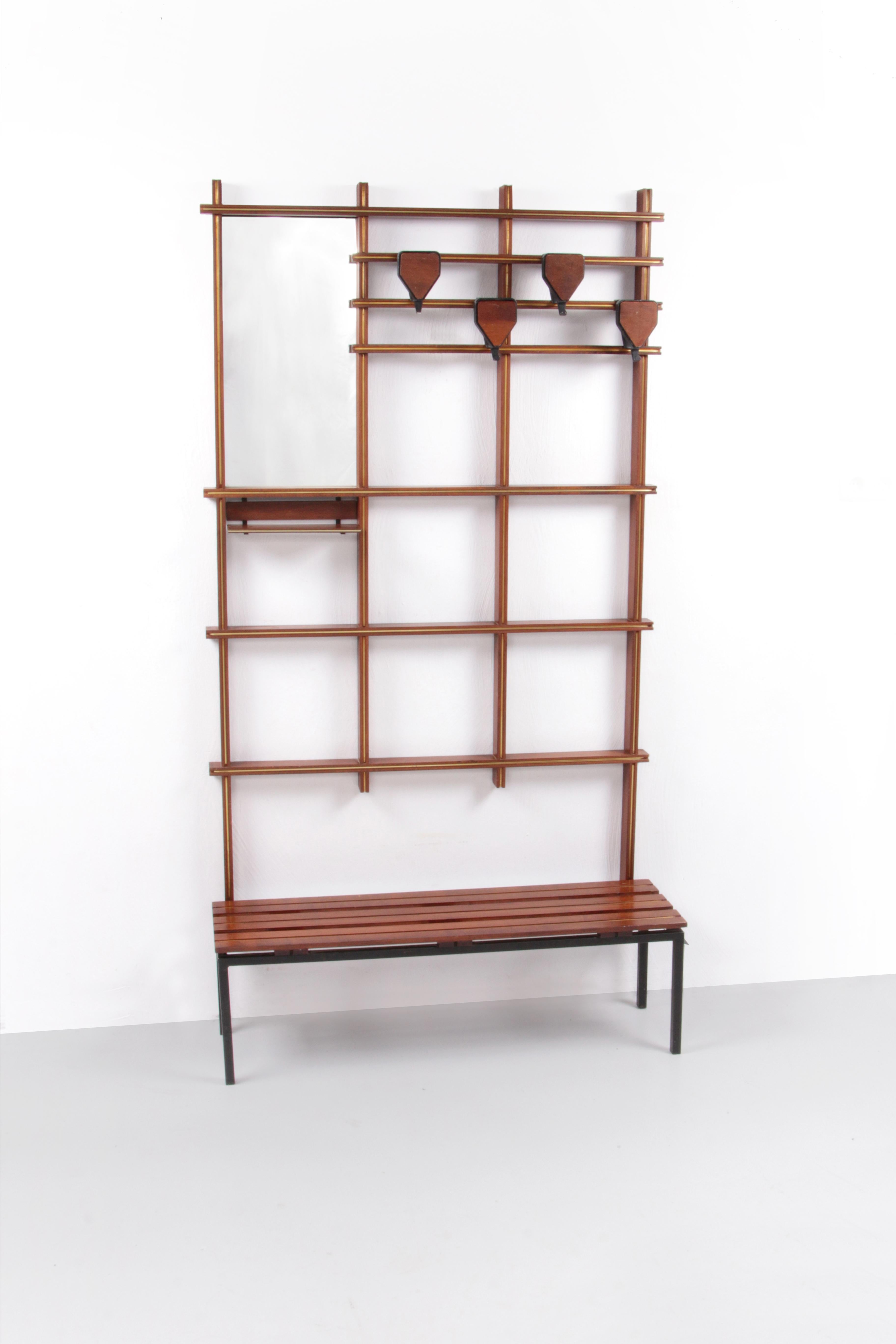 Italian Design wooden wall coat rack with bench, 1960,


This is a real Italian wall coat rack made of wood with a beautiful brass detail placed in the wood. There are 4 hooks that can be adjusted, 1 hook is without a hook. There is also a