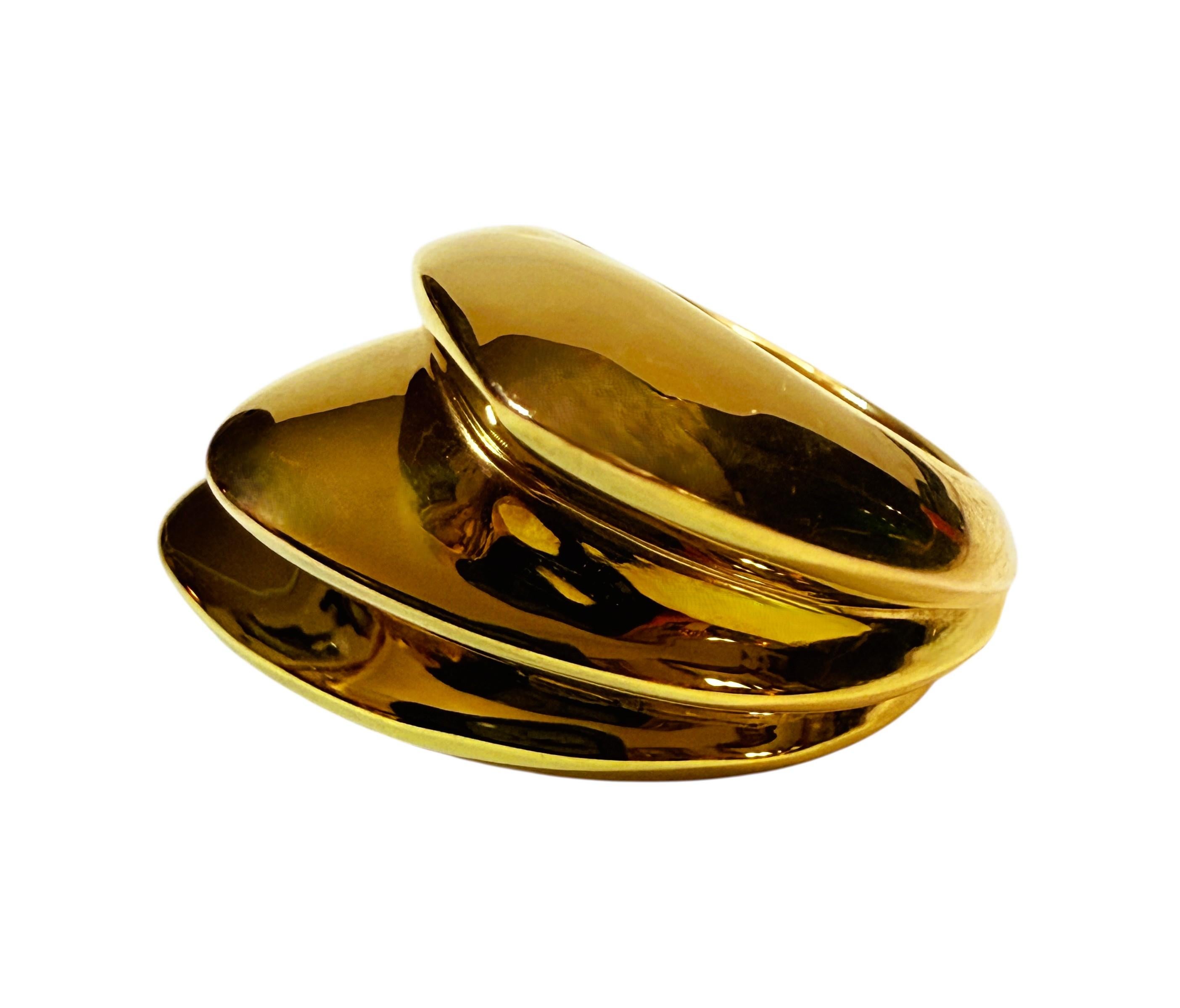 What a beautiful and unique ring!!  It is pre-owned but as you can tell from the photos it has very minimal signs of wear and is in excellent condition.   It is stamped 