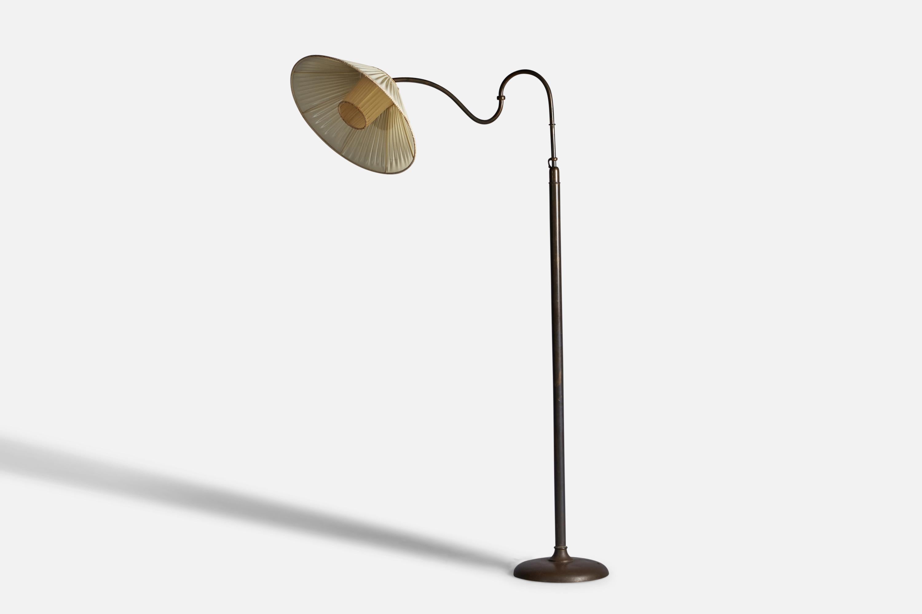 An adjustable brass and fabric floor lamp, designed and produced in Italy, c. 1940s.

Overall Dimensions: 66.75