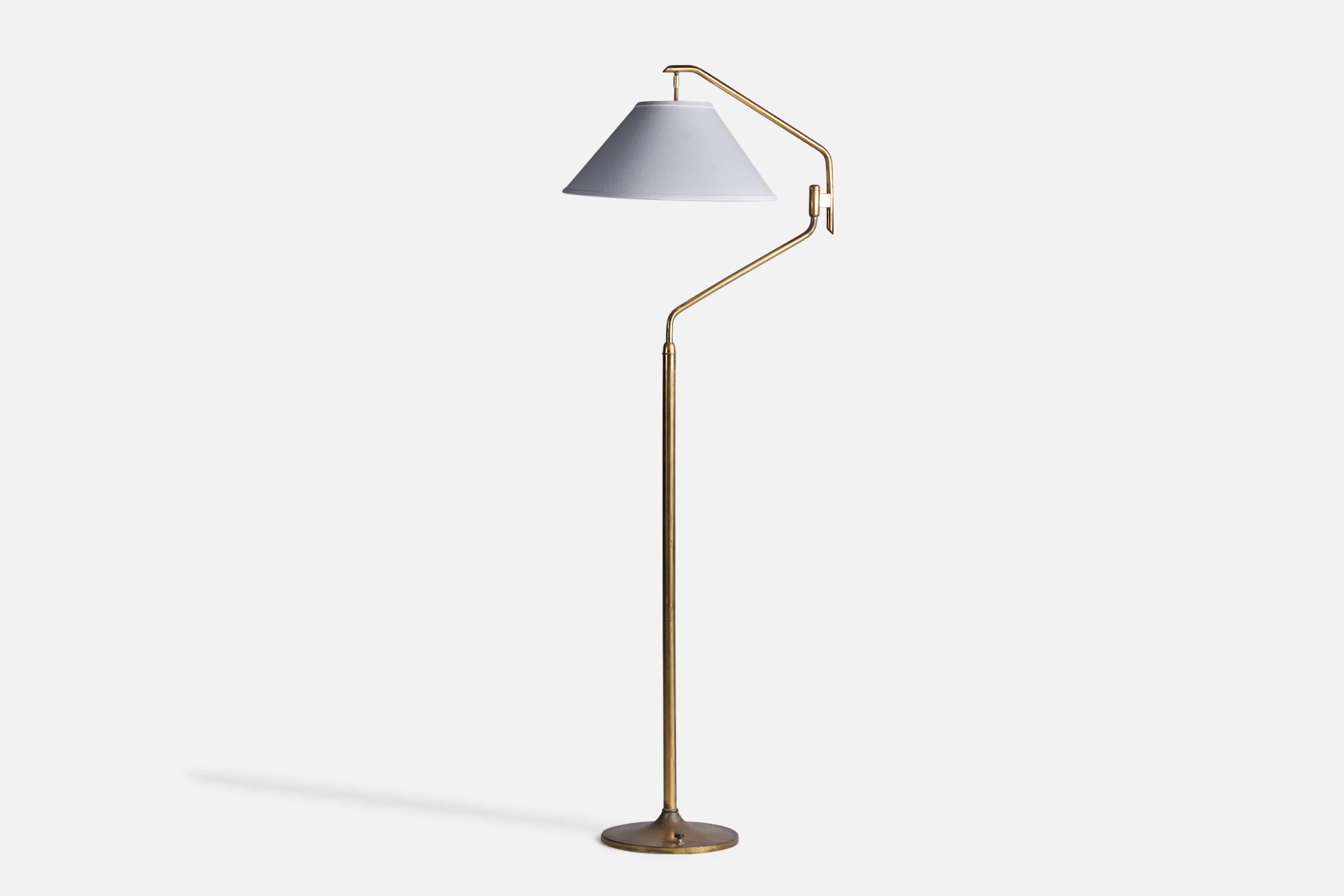 An adjustable brass and white fabric floor lamp, designed and produced in Italy, c. 1940s.

Overall Dimensions (inches): 67