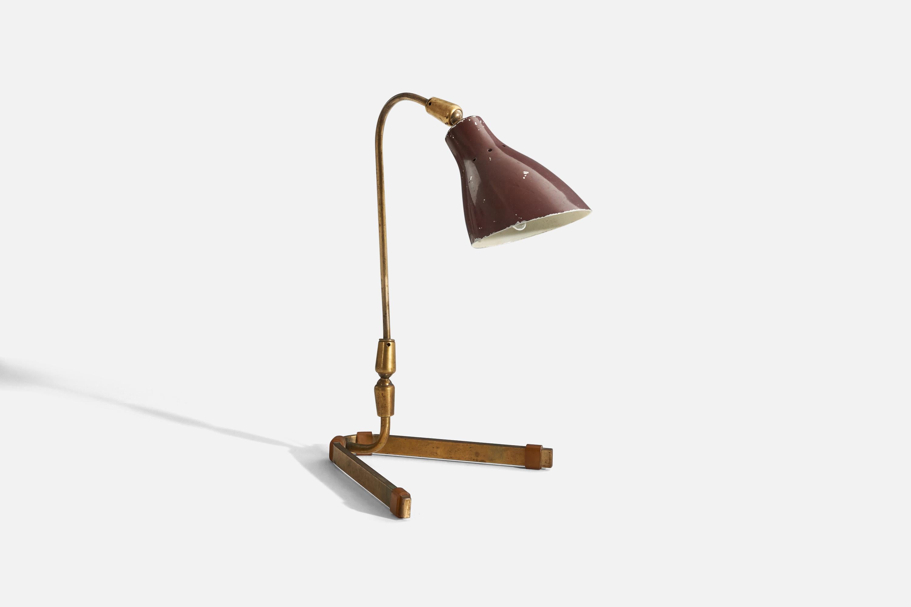 A metal and brass table lamp designed and produced in Italy, 1940s. 

Variable dimensions, measured as illustrated in the first image.
  