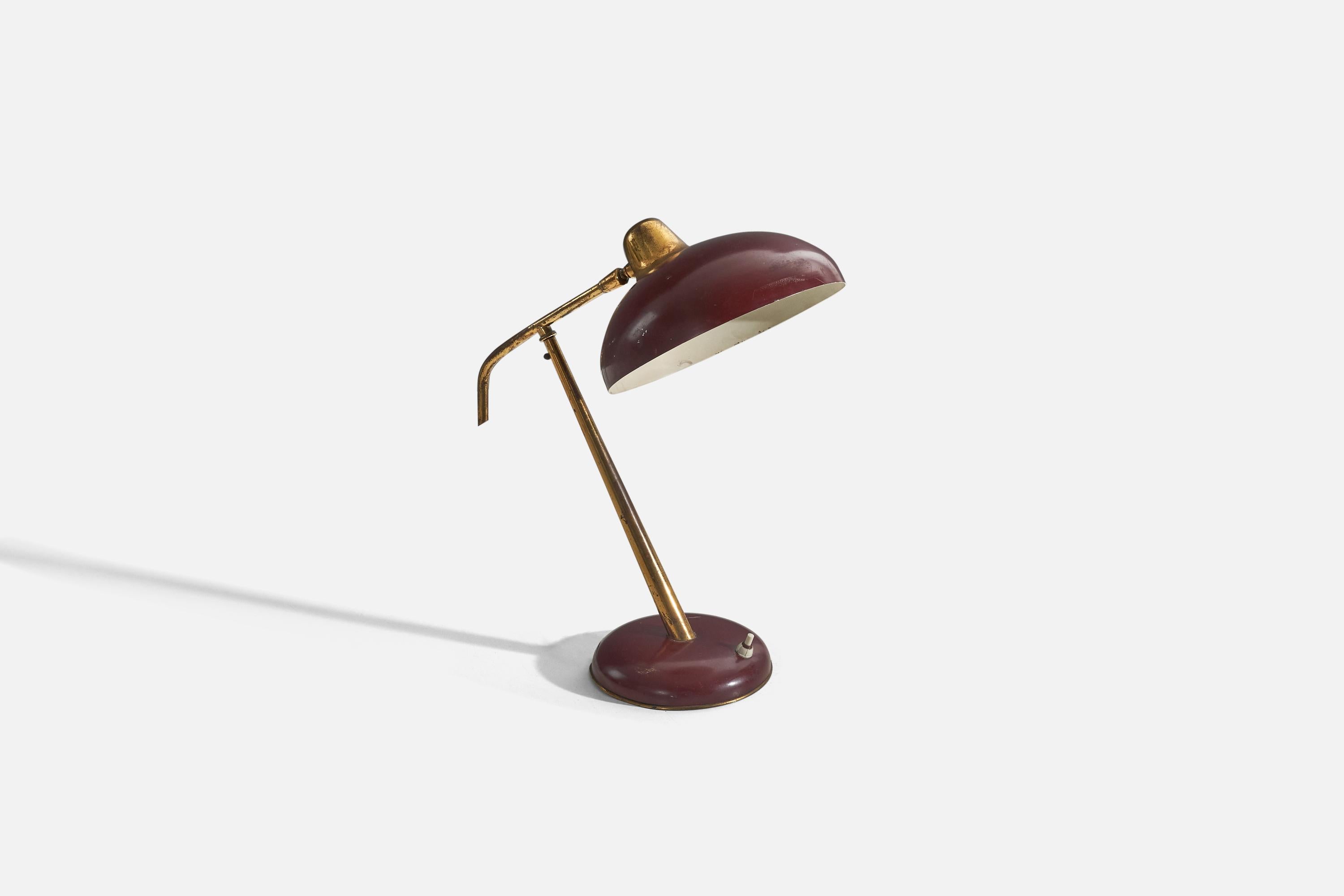 A brass and red metal table lamp designed and produced by an Italian designer, Italy, 1950s.

Variable dimensions, measured as illustrated in the first image.