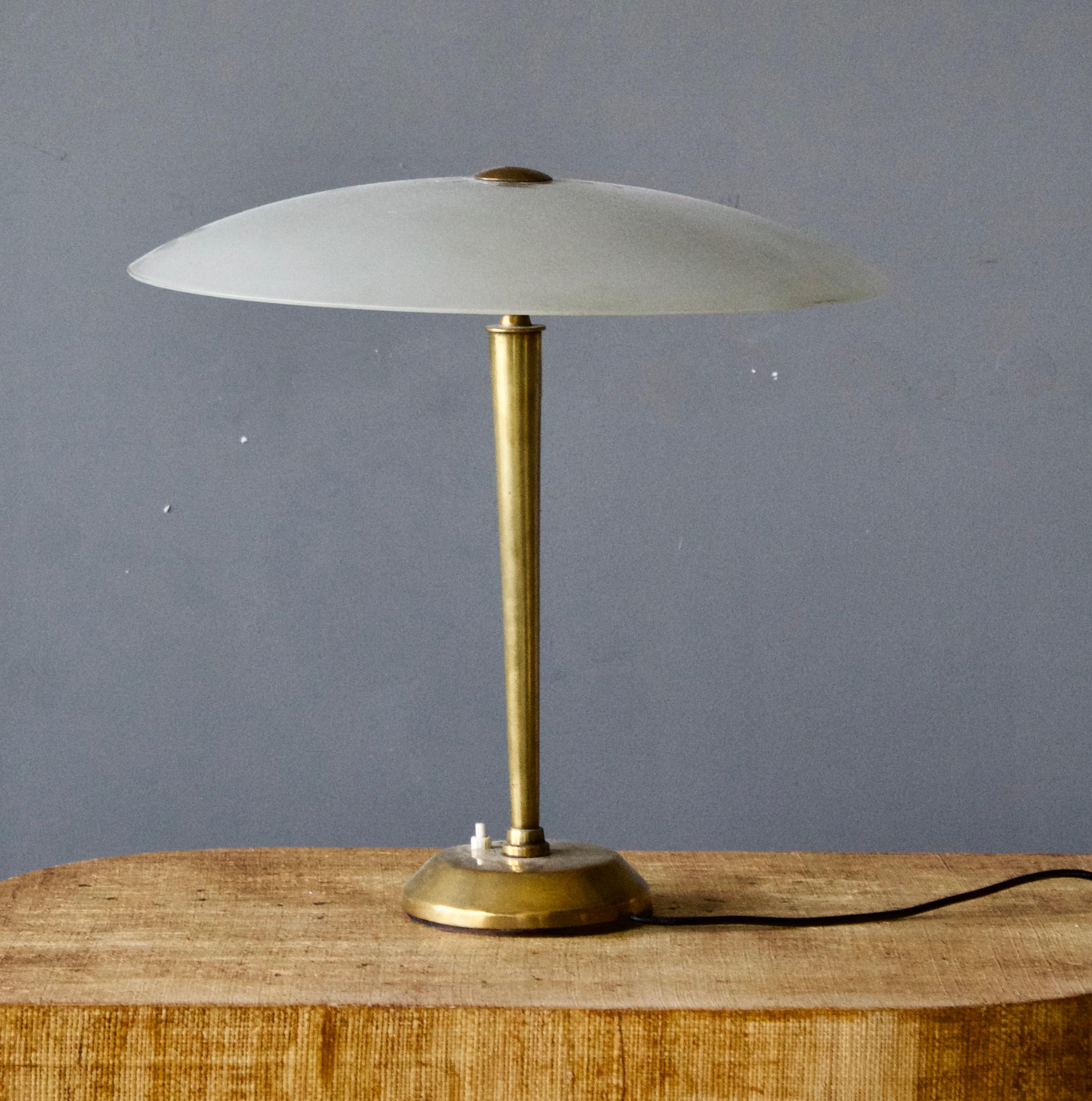 A table lamp, produced in Italy, 1940s. Features glass and brass. Position of lampshade is adjustable.

Other designers of the period include Gio Ponti, Fontana Arte, Max Ingrand, Franco Albini, and Josef Frank.