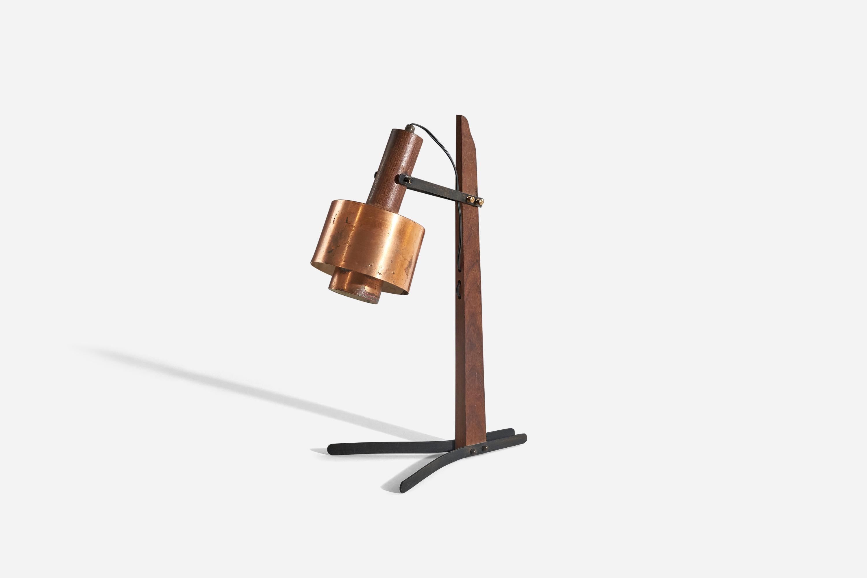 A teak, metal and copper table lamp designed and produced by an Italian designer, Italy, 1950s.

Variable dimensions, measured as illustrated in the first image.
