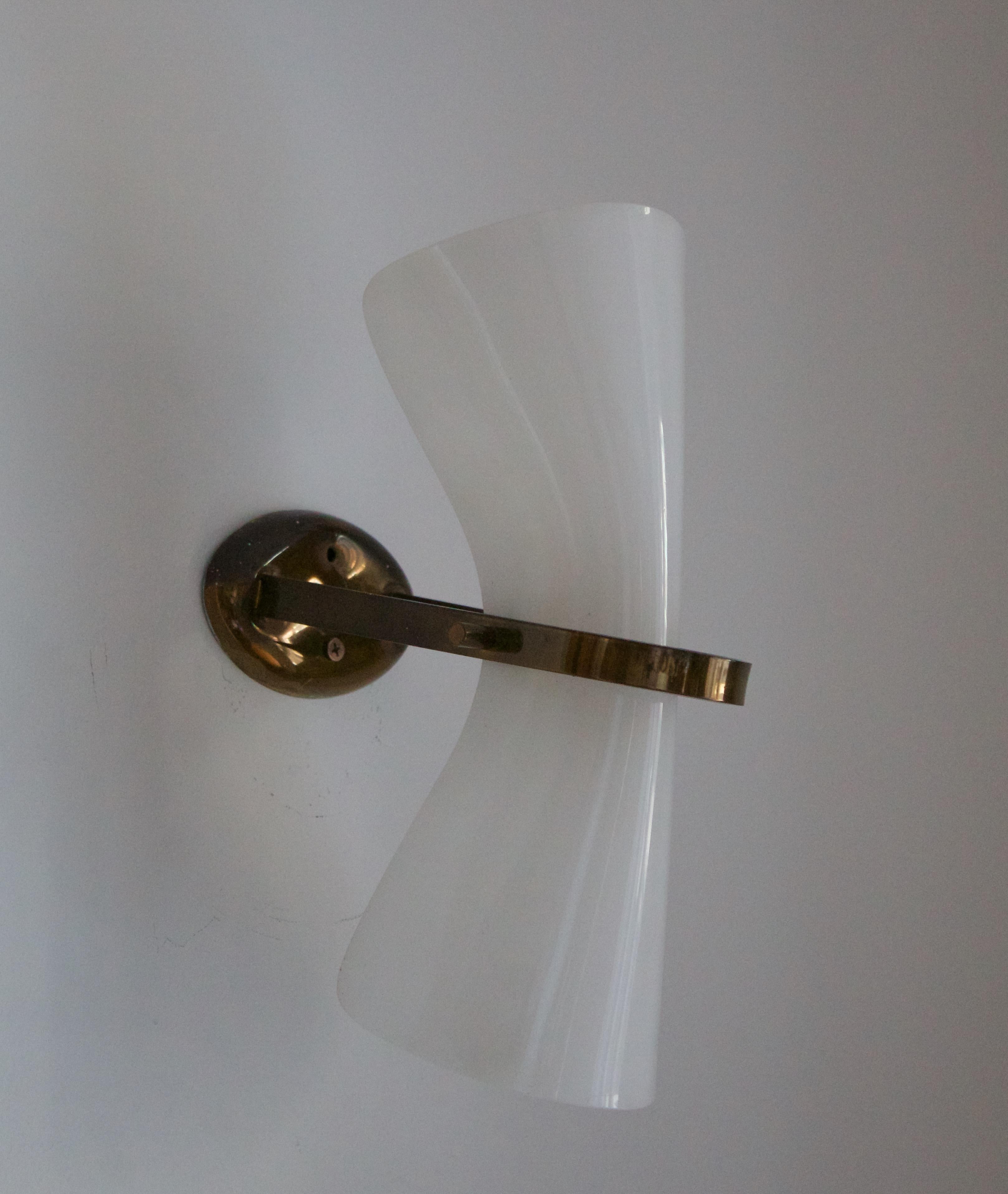 A wall light / Sconce. Designed and produced in Italy, c. 1960s.

Other designers of the period include Paavo Tynell, Jean Royère, Hans Bergström, Hans-Agne Jakobsson, and Kaare Klint.