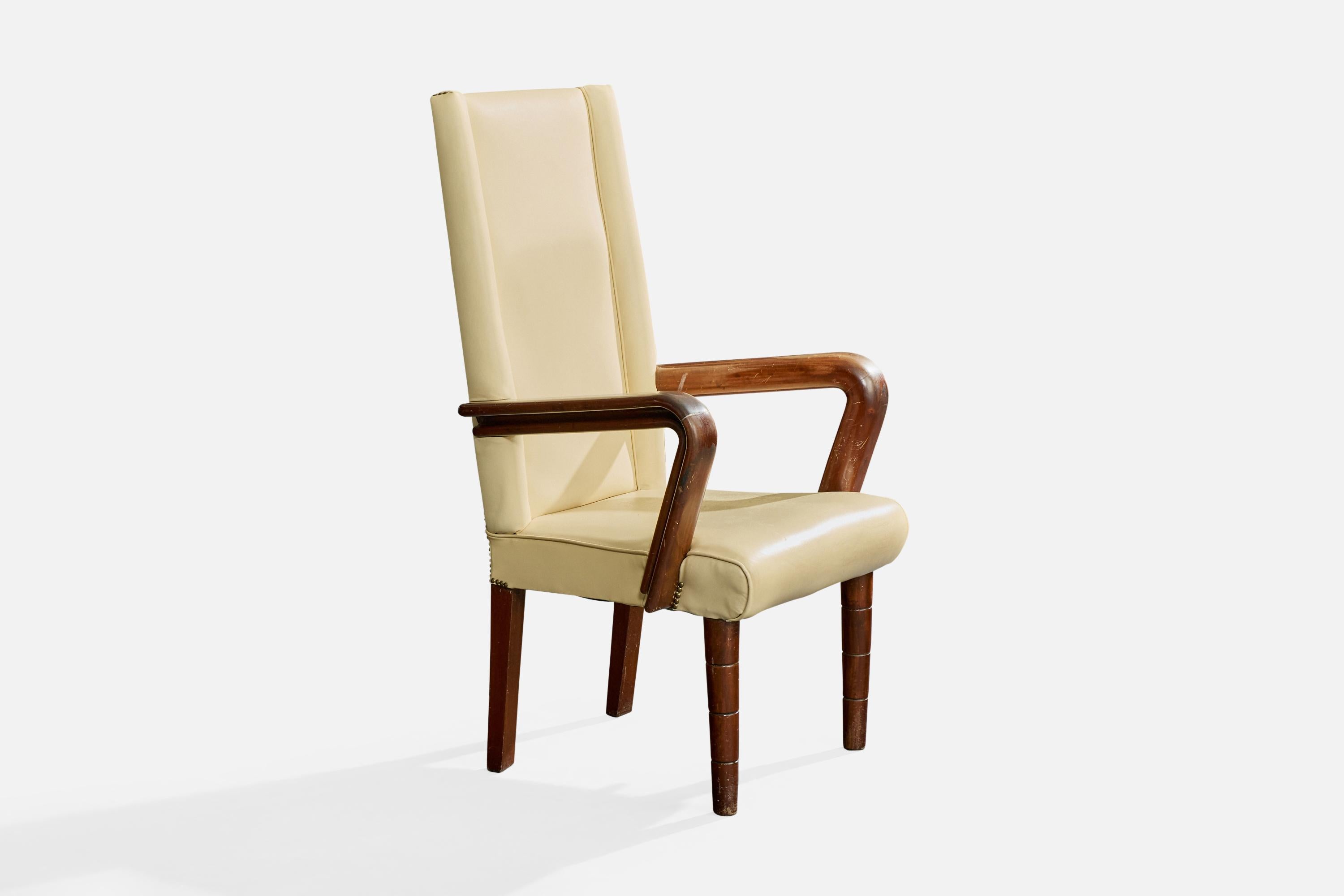 A dark-stained wood and beige vinyl armchair or side chair designed and produced in Italy, c. 1930s.

Minor staining and imperfections to seat cushion.

Moderate wear on arm rests.

Mild to moderate scuffing on legs and feet.

Patina on nailheads of