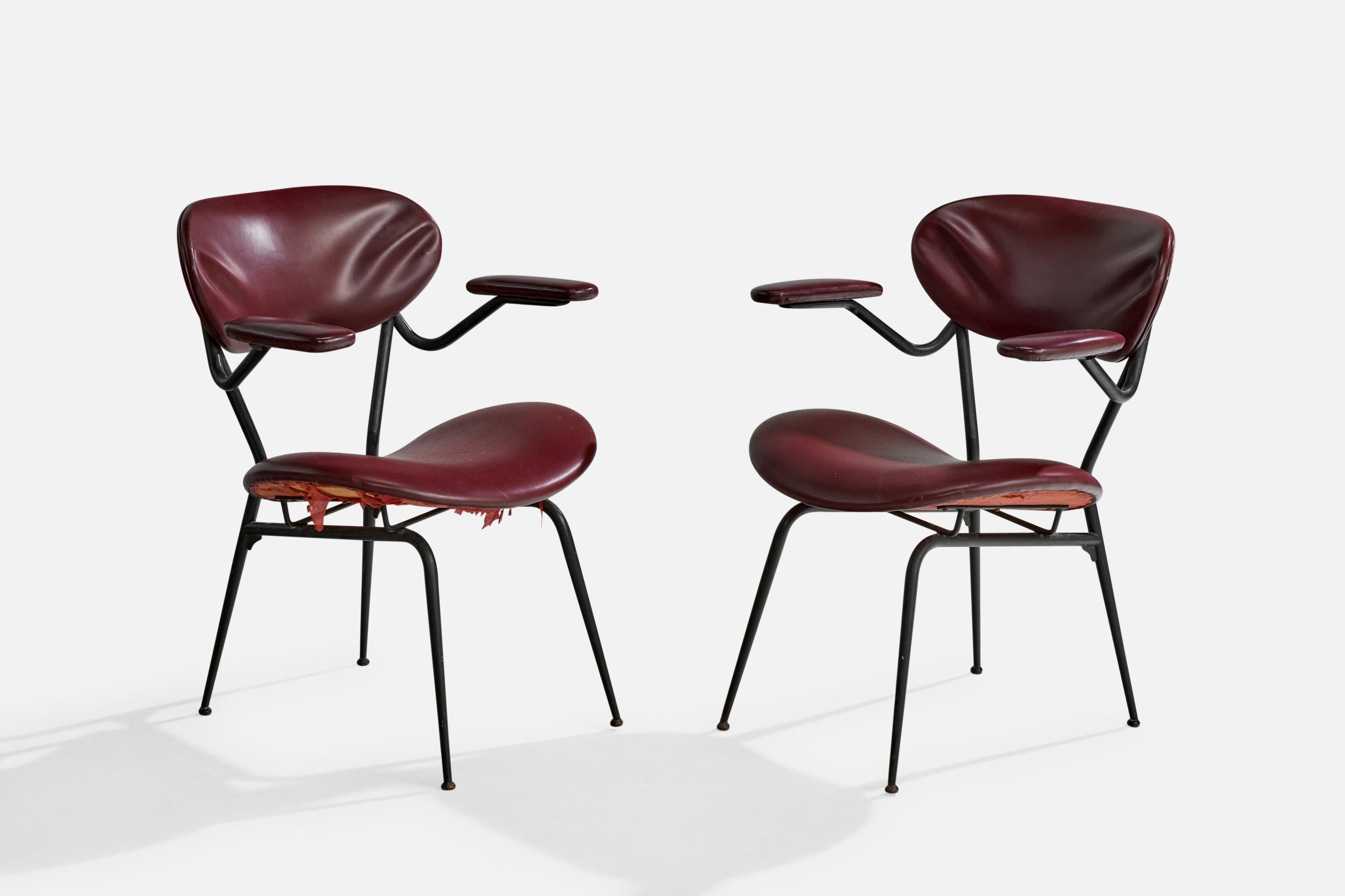 A pair of black-lacquered metal and red vinyl armchairs or side chairs designed and produced in Italy, c. 1960s.

Overall Dimensions (inches): 29.5