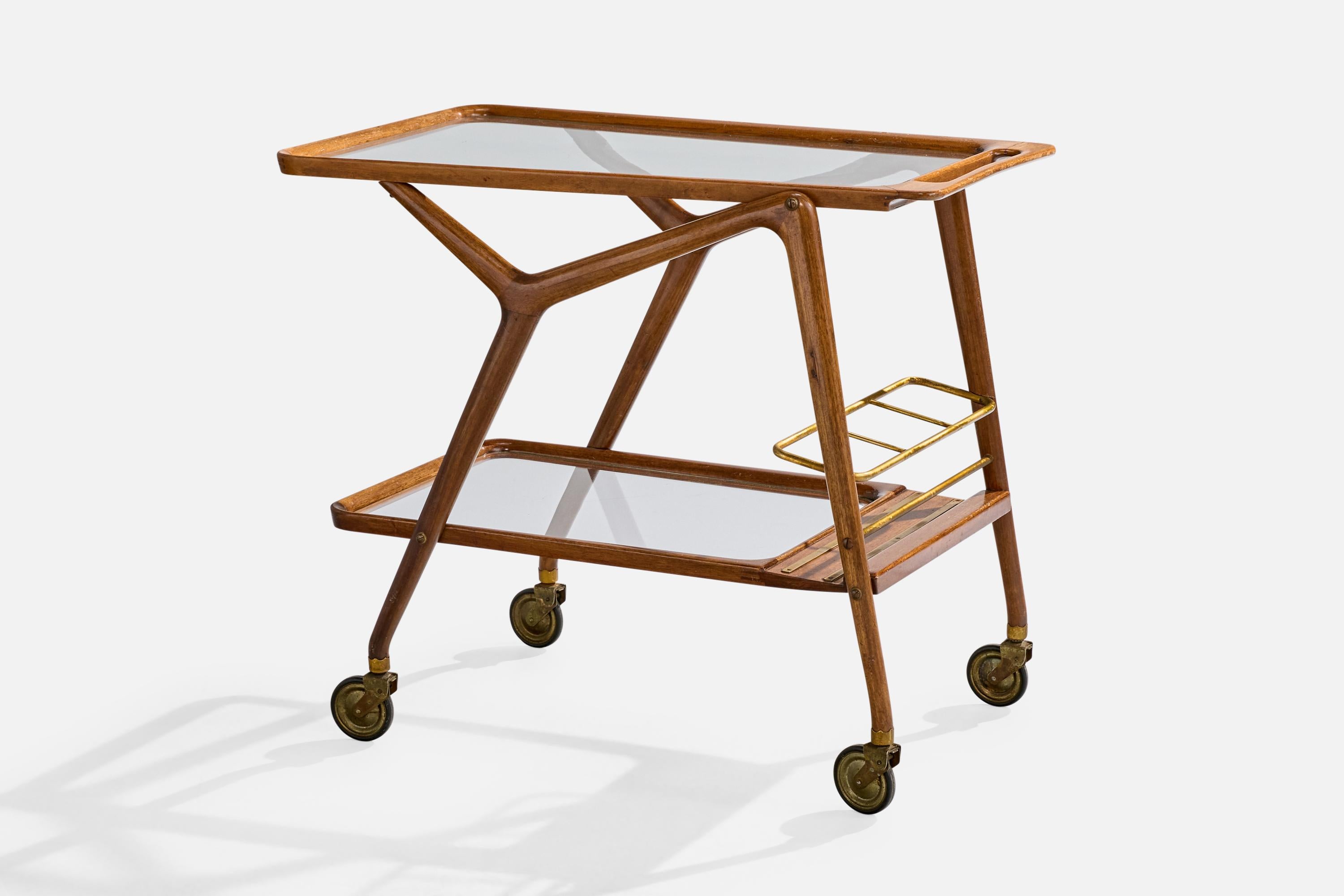 Carrito de bar de madera, latón y cristal, diseñado y fabricado en Italia, c. 1950.

Dimensiones totales (pulgadas): 27,25 