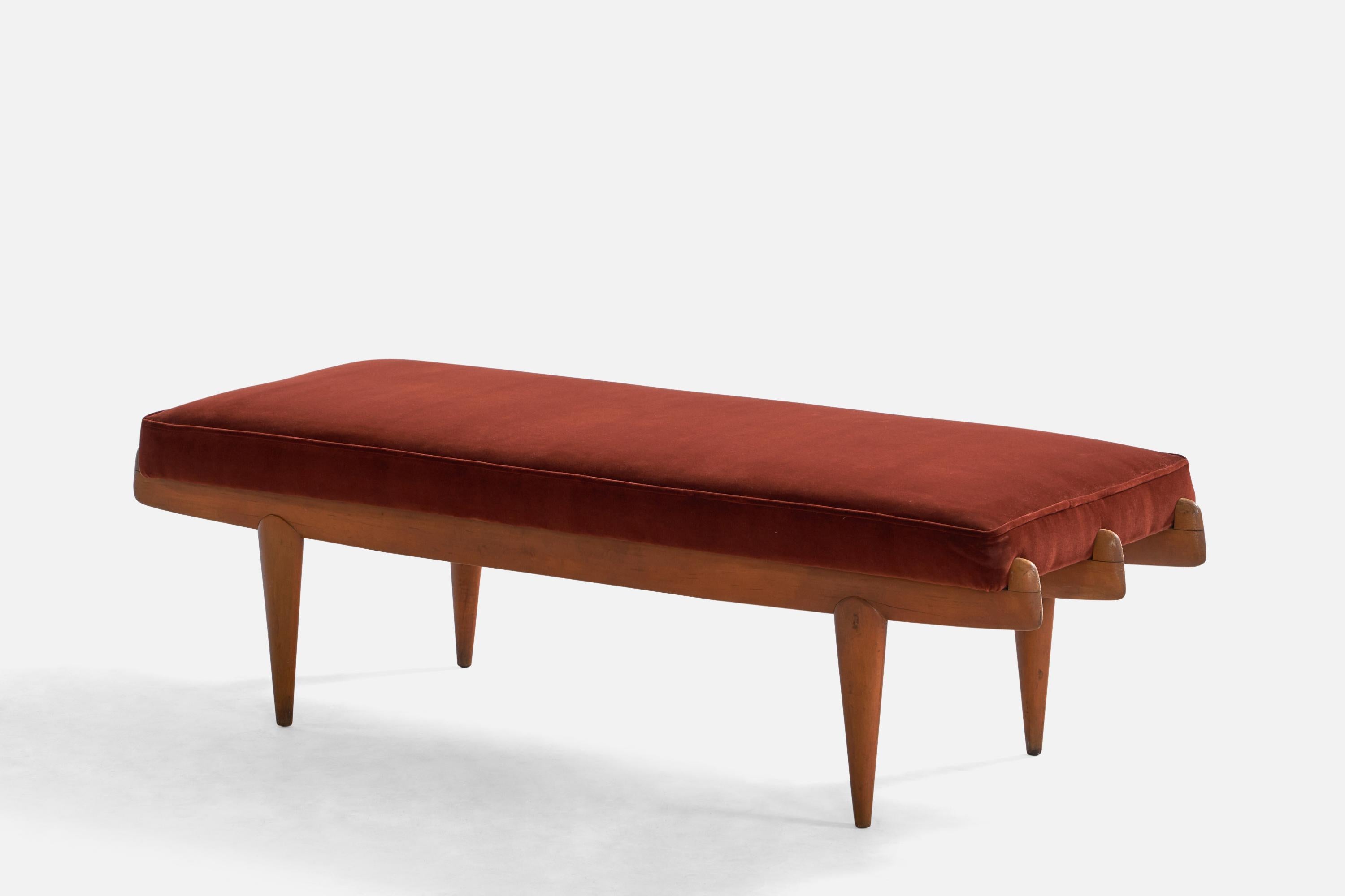 A beech and red mohair bench designed and produced in Italy, 1940s.

Seat height: 16”
