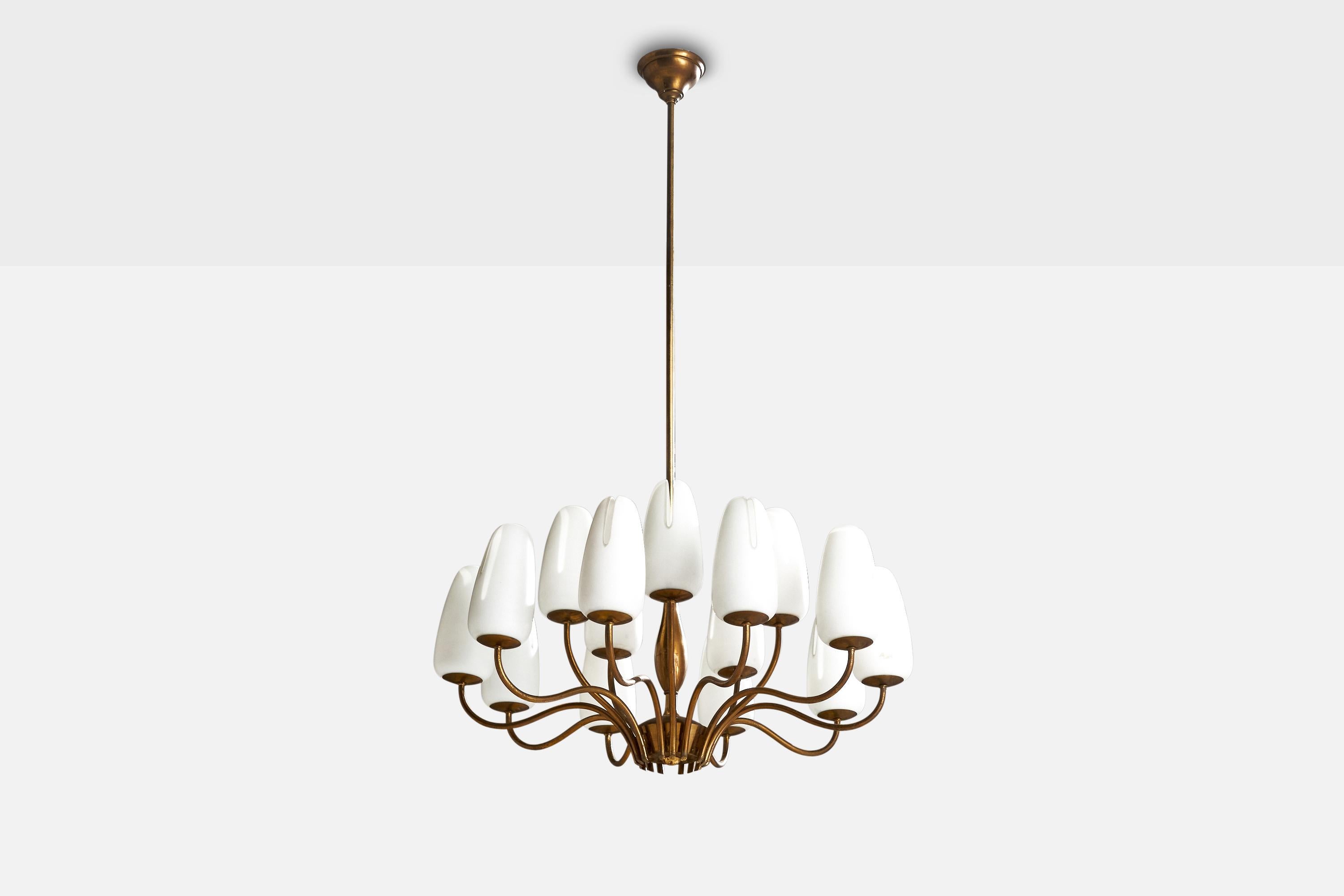 A sizeable brass and opaline glass chandelier designed and produced in Italy, 1950s.

Dimensions of canopy (inches): 2.5” H x 4.5”  Diameter
Socket takes standard E-14 bulbs. 15 sockets.There is no maximum wattage stated on the fixture. All lighting