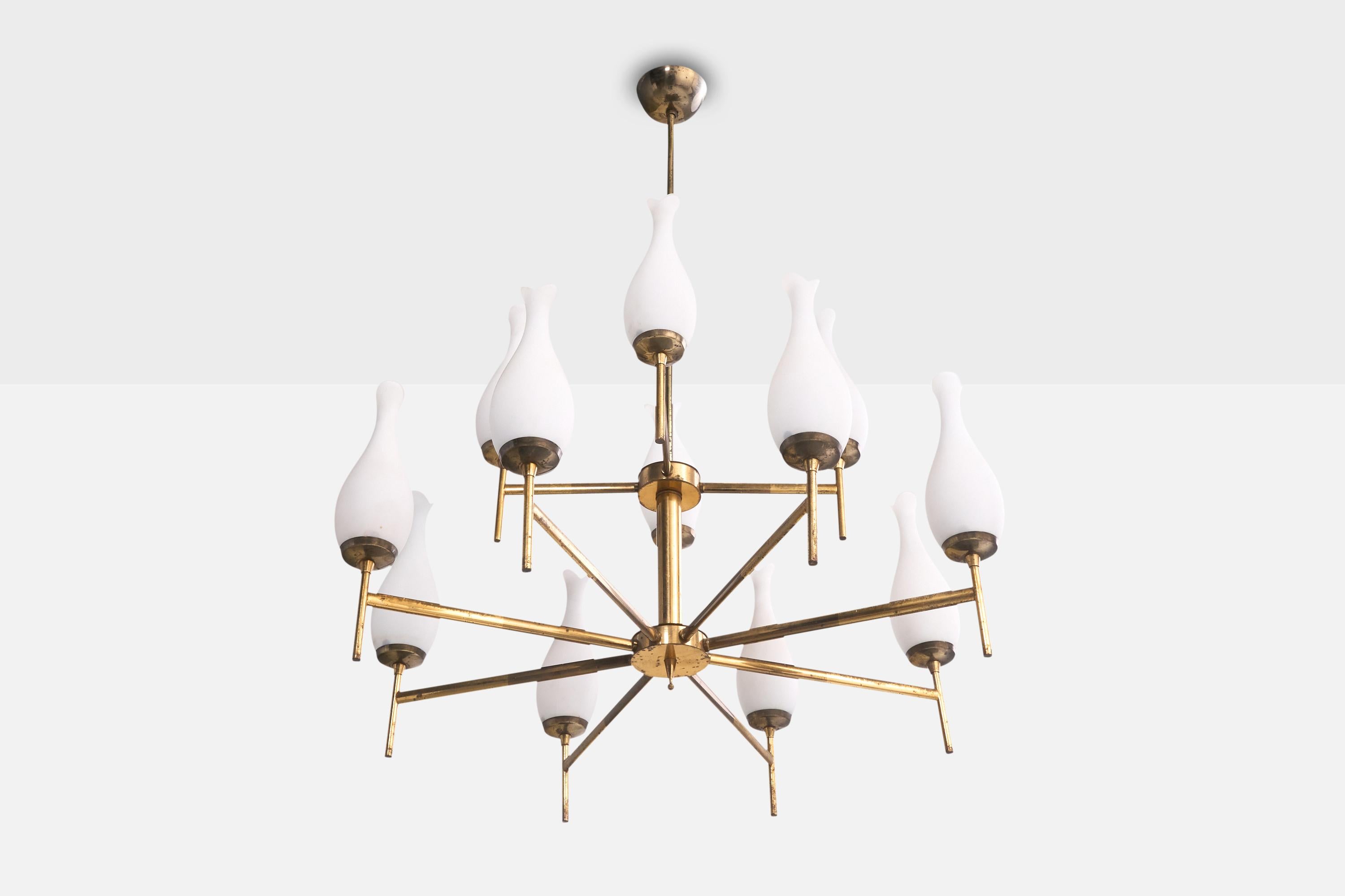 A sizable brass and white opaline glass chandelier designed and produced in Italy, c. 1950s.

Heavy oxidation present throughout brass. Light discoloration to glass shades.

Overall Dimensions (inches): 35.625” H x 29” Diameter

Dimensions of