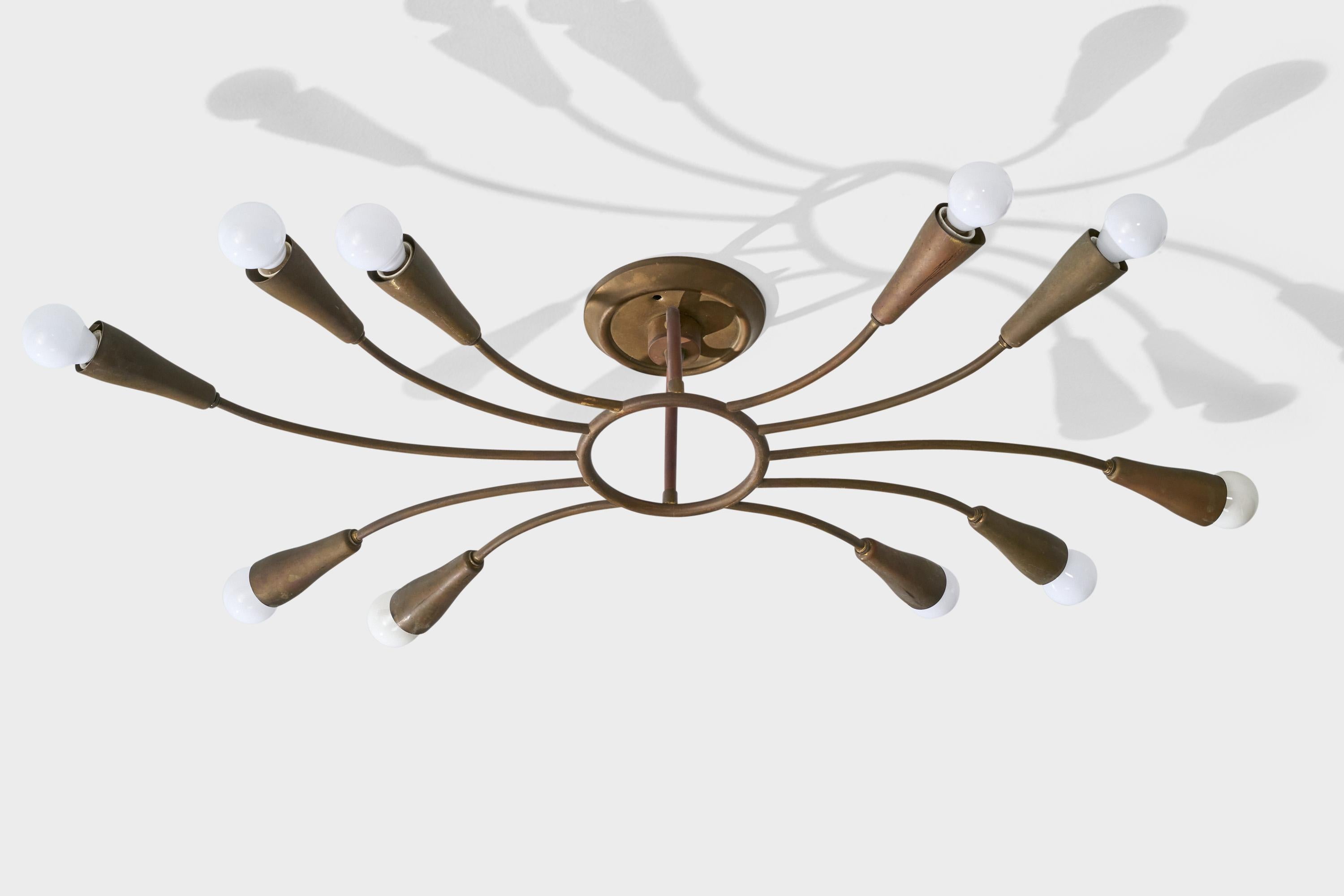 A brass chandelier designed and produced in Italy, c. 1940s.

Presents with dramatic oxidation.

Overall Dimensions (inches): 6” H x 36.625” W x 22.5“ D

Bulb Specifications: E-14 frosted round

Number of Sockets: 10

All lighting will be converted