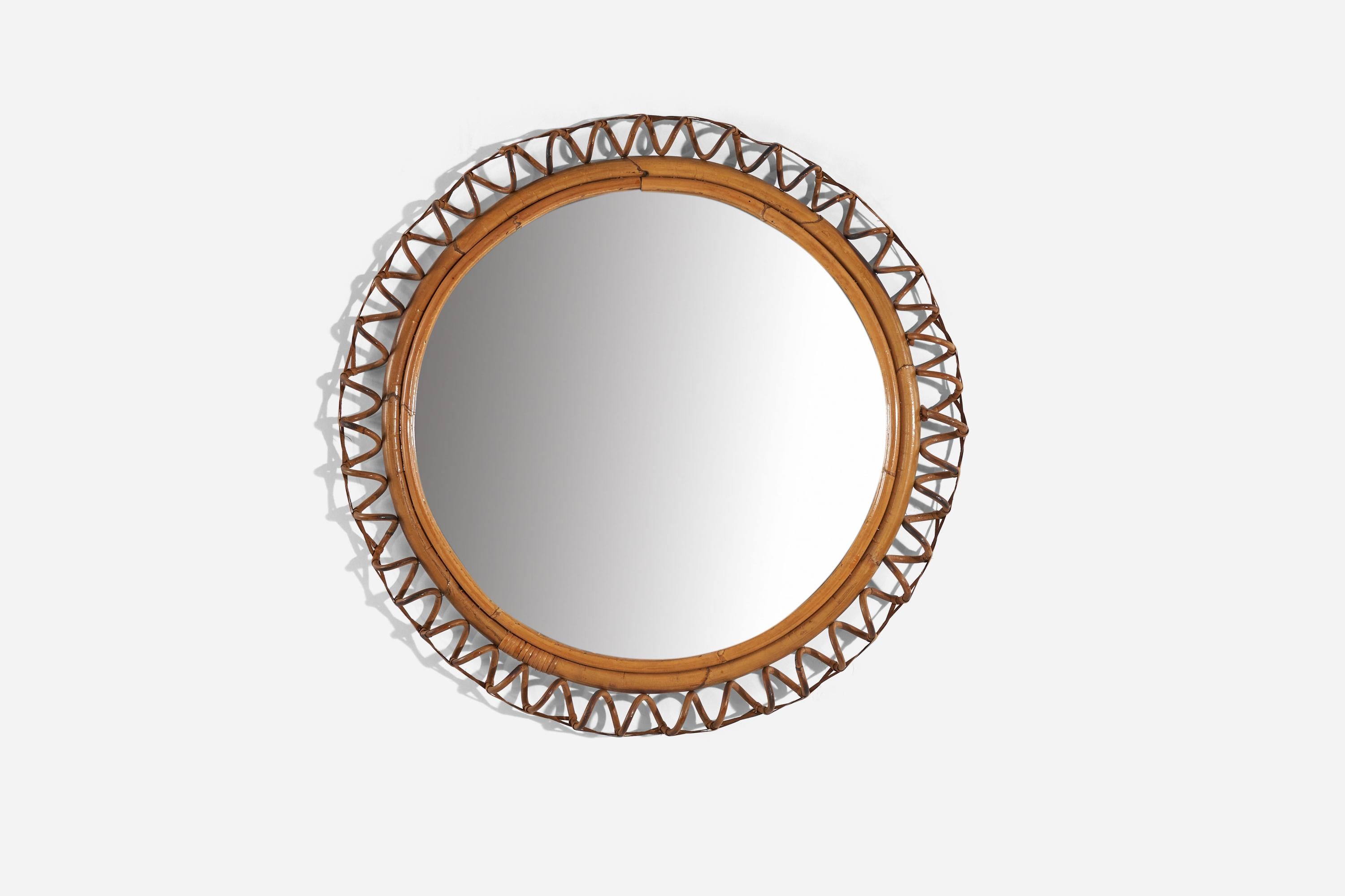 A circular, rattan and bamboo wall mirror designed and produced by an Italian designer, Italy, 1950s-1960s.
   