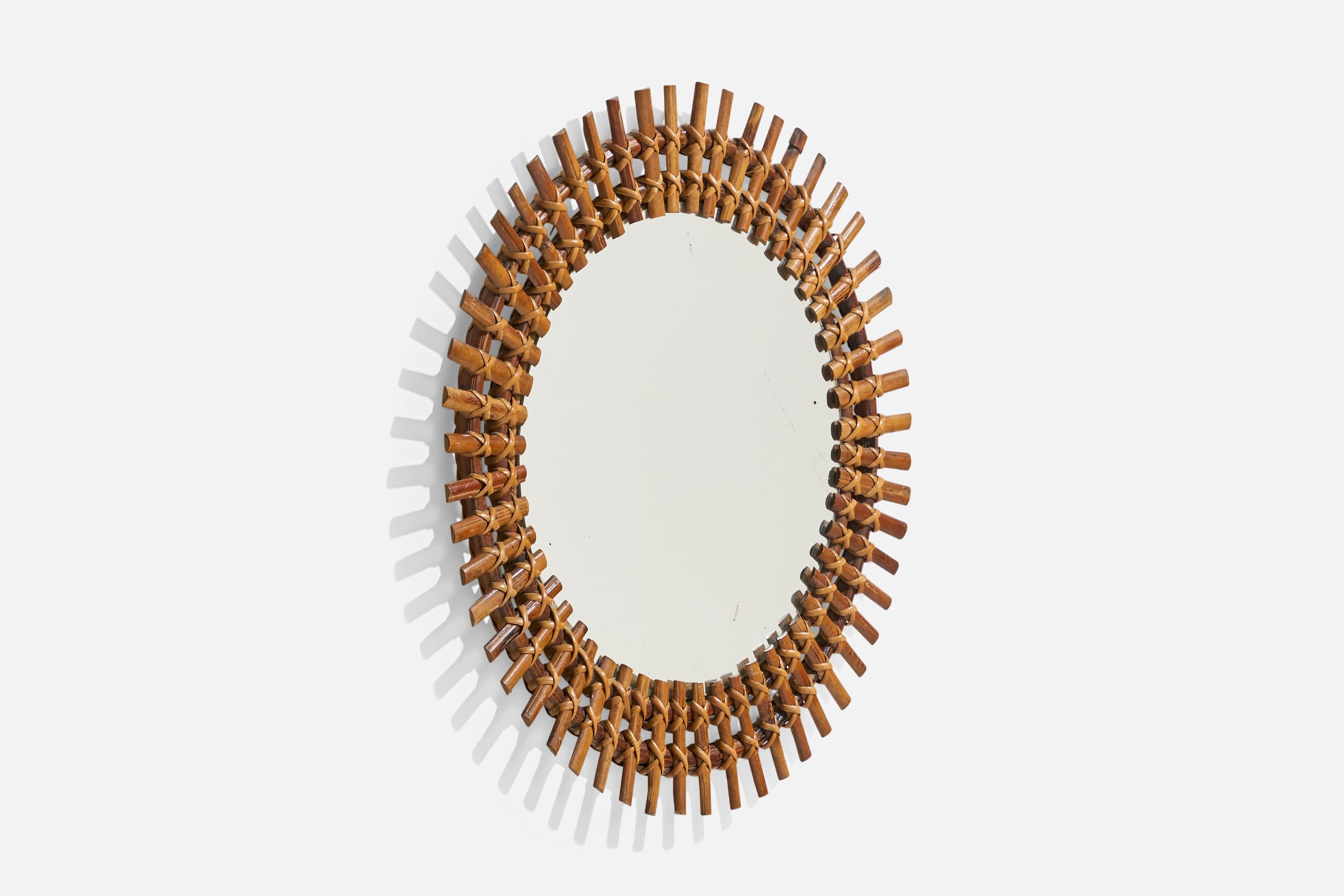 Mid-Century Modern Designer italien, miroir mural circulaire, rotin, verre de miroir, Italie, vers les années 1950 en vente