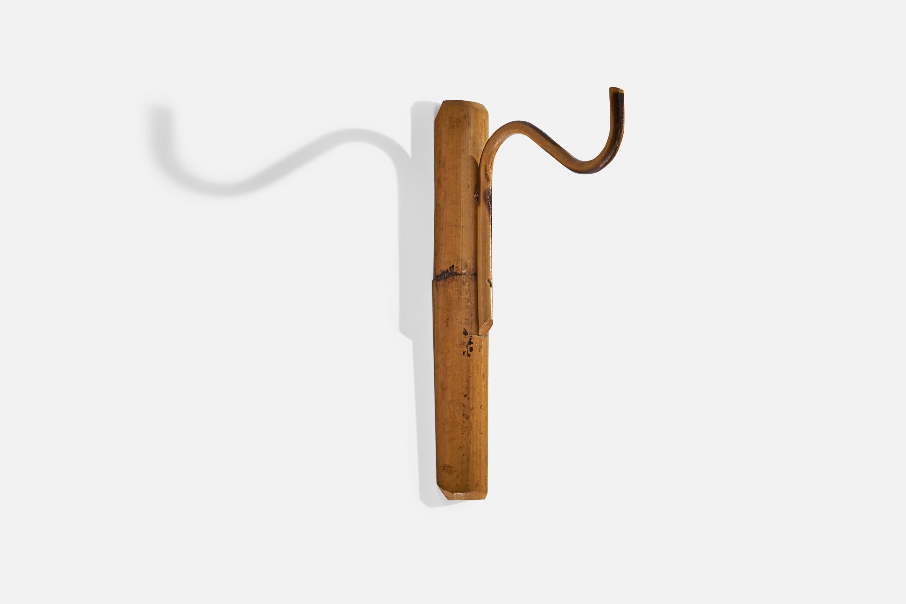 A bamboo coat hanger designer and produced in Italy, c. 1960s.