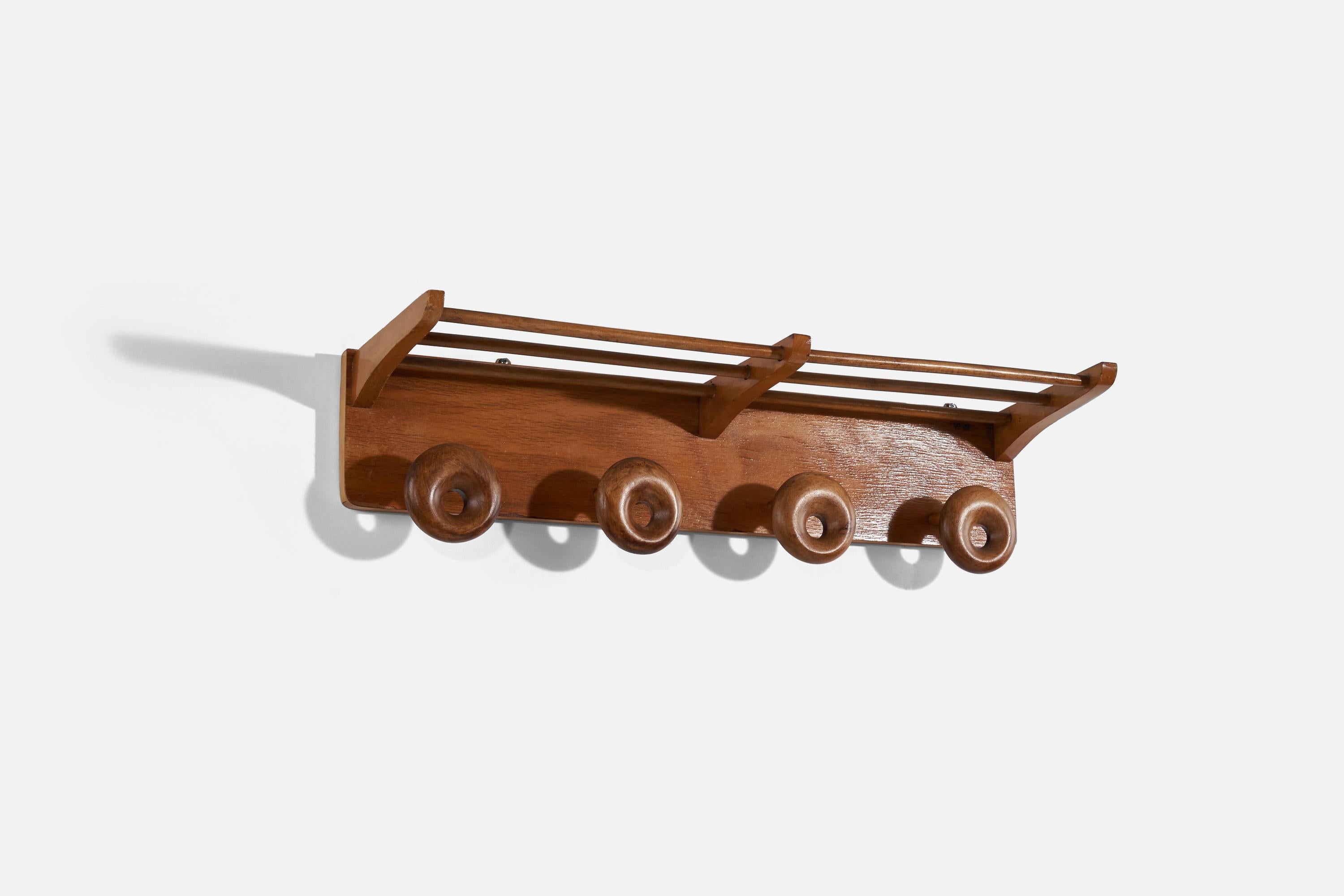 A wood coat rack designed and produced by an Italian designer, Italy, 1950s.