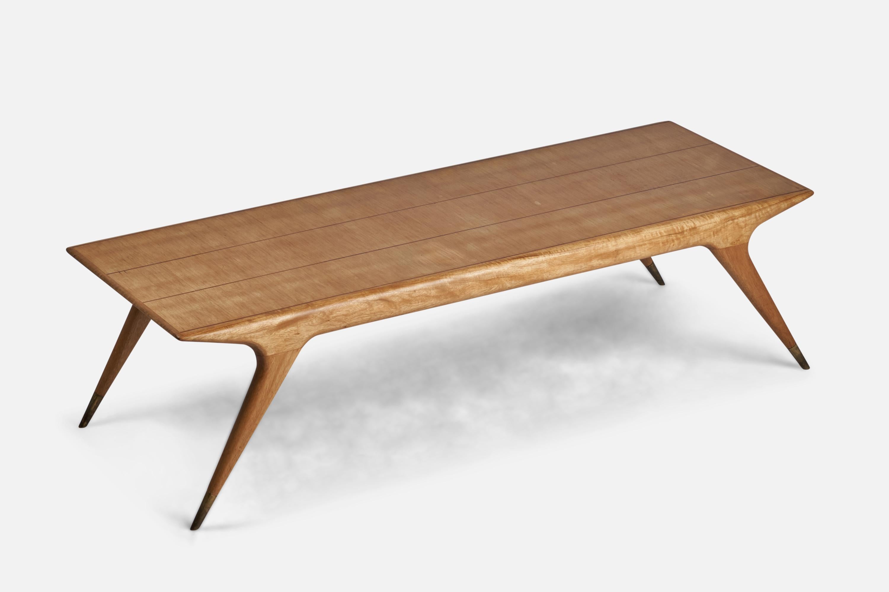 A beech and brass coffee table with inlays designed and produced in Italy c. 1950s.