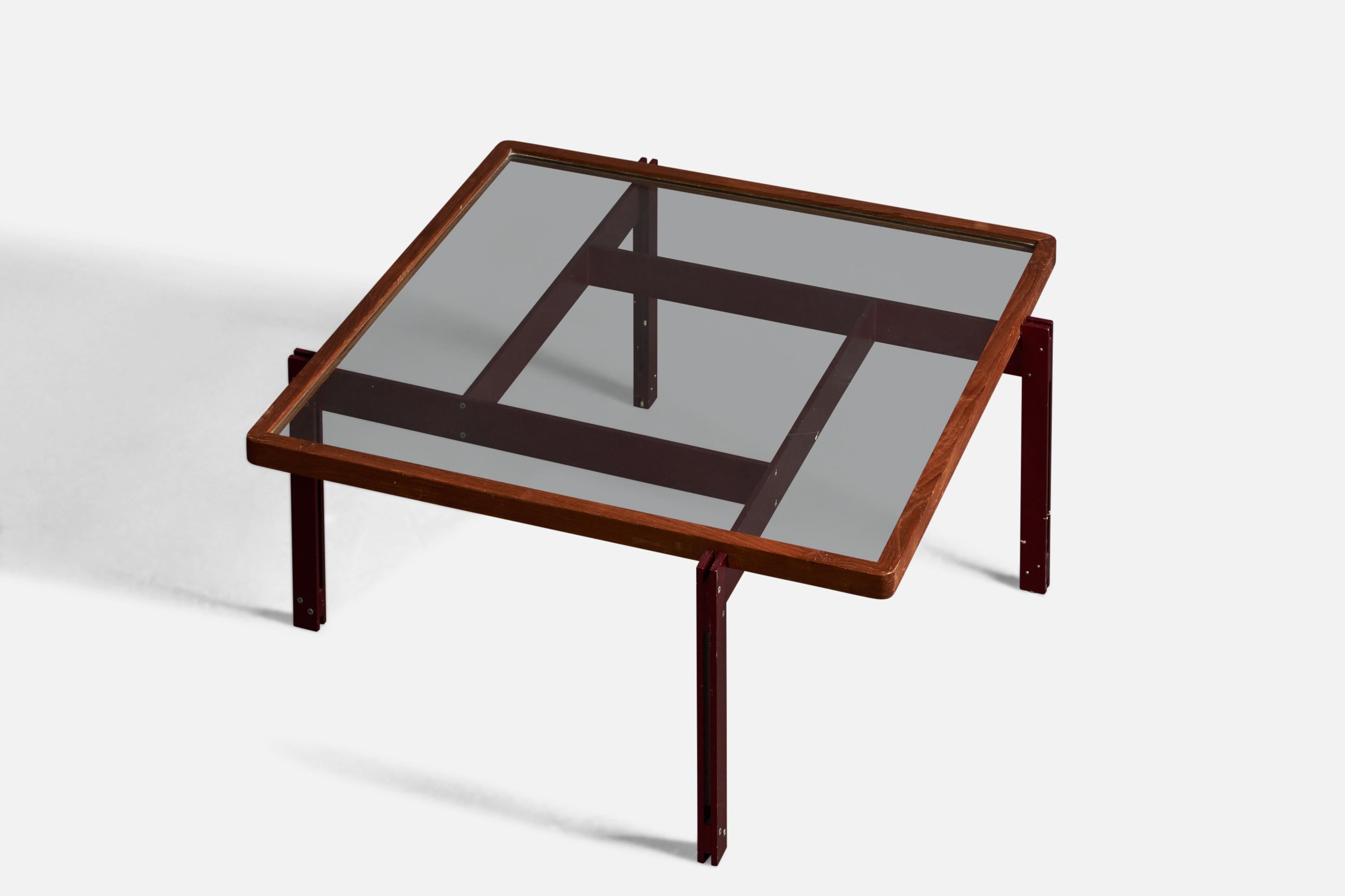 A teak, glass and red-lacquered metal coffee or cocktail table, designed and produced in Italy, c. 1960s.
