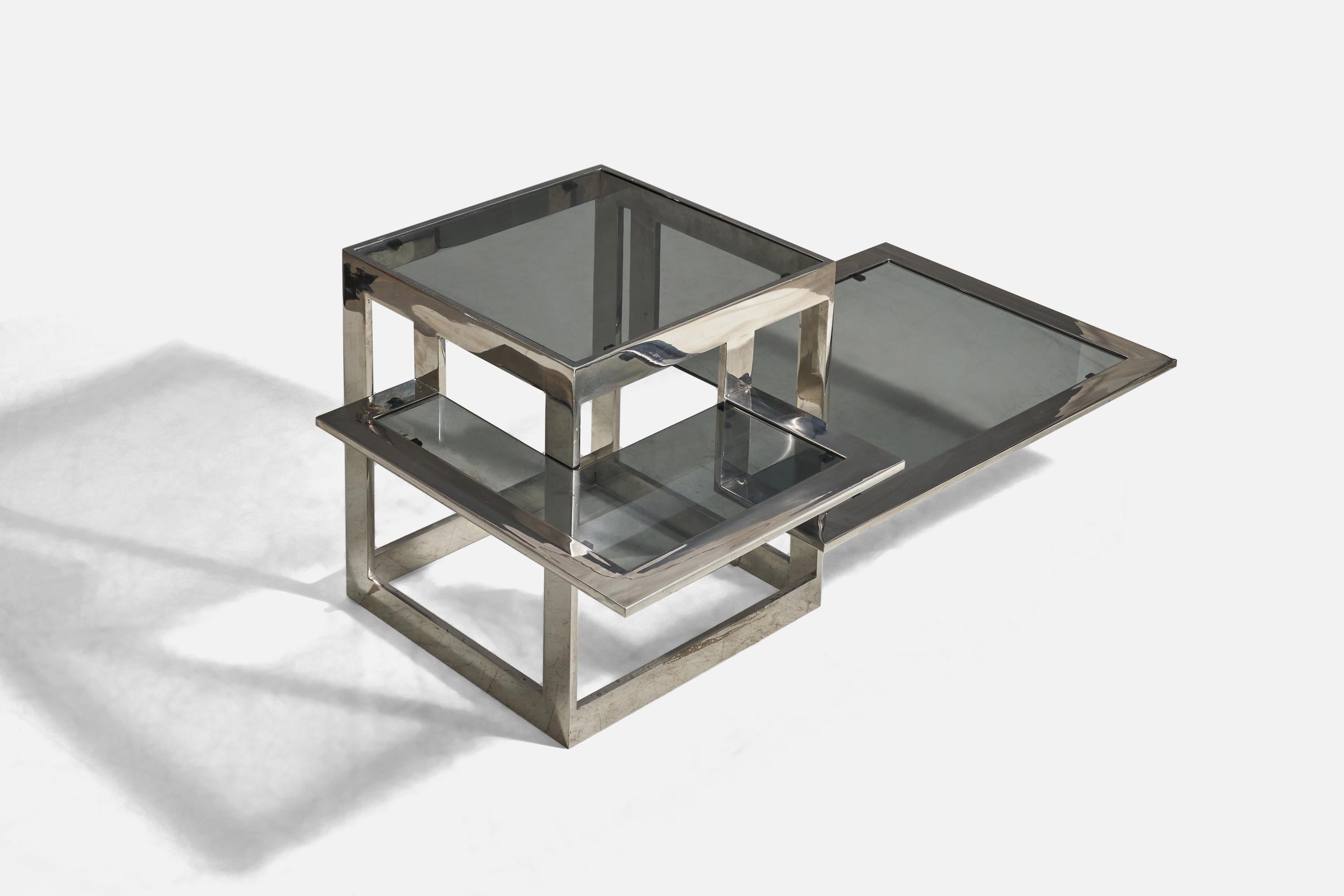 A steel and smoked glass coffee table designed and produced in Italy, 1970s.