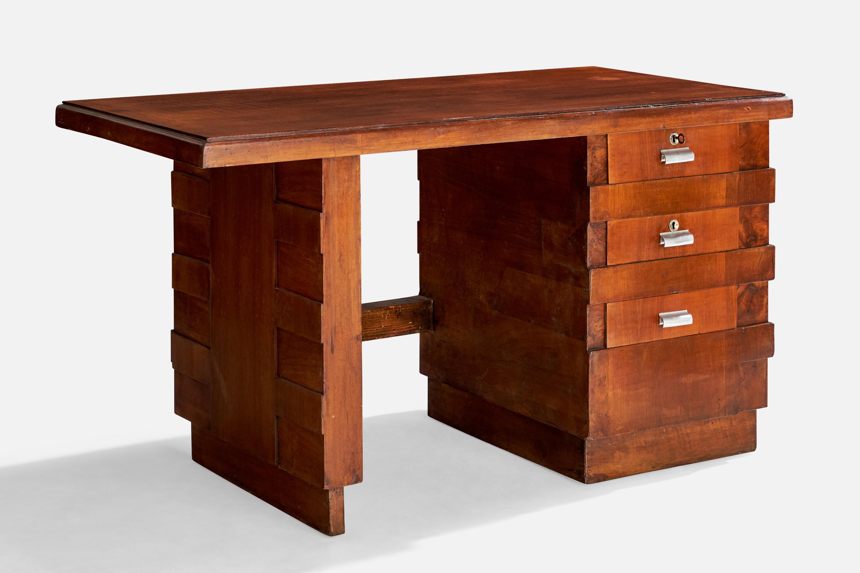 Escritorio de madera teñida de oscuro y metal, diseñado y fabricado en Italia, c. 1930.

Dimensiones: 31,75