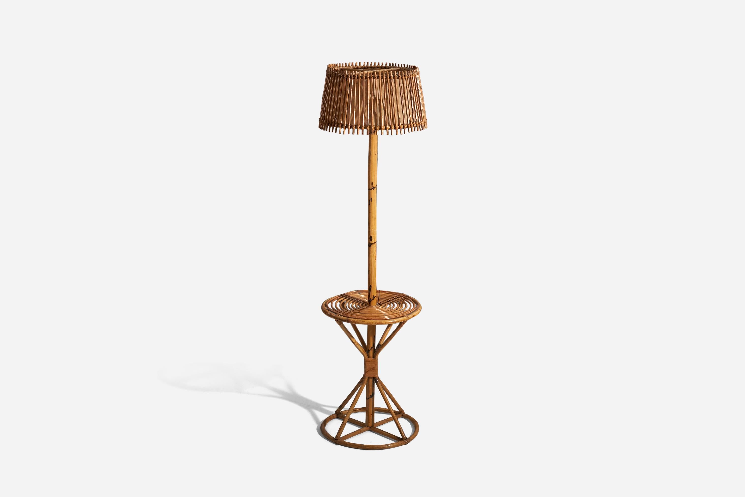 A bamboo and rattan floor lamp designed and produced by an Italian designer, Italy, 1960s.

